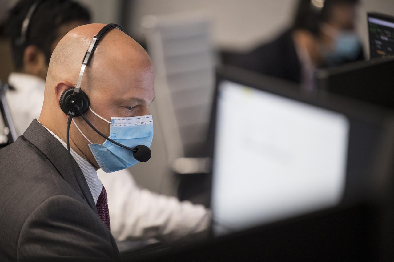 Michael Hess, operations integration manager for NASA's Commercial Crew Program, monitors the countdown of the launch of a SpaceX Falcon 9 rocket carrying the company's Crew Dragon spacecraft on NASA’s SpaceX Crew-2 mission with NASA astronauts Shane Kimbrough and Megan McArthur, ESA (European Space Agency) astronaut Thomas Pesquet, and Japan Aerospace Exploration Agency (JAXA) astronaut Akihiko Hoshide onboard, Friday, April 23, 2021, in firing room four of the Launch Control Center at NASA’s Kennedy Space Center in Florida. NASA’s SpaceX Crew-2 mission is the second crew rotation mission of the SpaceX Crew Dragon spacecraft and Falcon 9 rocket to the International Space Station as part of the agency’s Commercial Crew Program. Kimbrough, McArthur, Pesquet, and Hoshide launched at 5:49 a.m. EDT, from Launch Complex 39A at the Kennedy Space Center. Photo Credit: (NASA/Joel Kowsky)