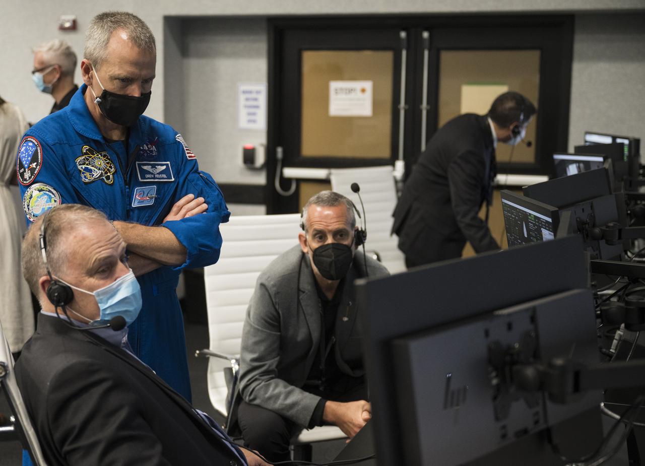 Norm Knight, deputy director of Flight Operations at NASA's Johnson Space Center, left, Andrew Feustel, deputy chief of the Astronaut Office, center, Lee Rosen, vice president of Mission and Launch Operations at SpaceX, monitor the countdown of the launch of a SpaceX Falcon 9 rocket carrying the company's Crew Dragon spacecraft on NASA’s SpaceX Crew-2 mission with NASA astronauts Shane Kimbrough and Megan McArthur, ESA (European Space Agency) astronaut Thomas Pesquet, and Japan Aerospace Exploration Agency (JAXA) astronaut Akihiko Hoshide onboard, Friday, April 23, 2021, in firing room four of the Launch Control Center at NASA’s Kennedy Space Center in Florida. NASA’s SpaceX Crew-2 mission is the second crew rotation mission of the SpaceX Crew Dragon spacecraft and Falcon 9 rocket to the International Space Station as part of the agency’s Commercial Crew Program. Kimbrough, McArthur, Pesquet, and Hoshide launched at 5:49 a.m. EDT, from Launch Complex 39A at the Kennedy Space Center. Photo Credit: (NASA/Joel Kowsky)
