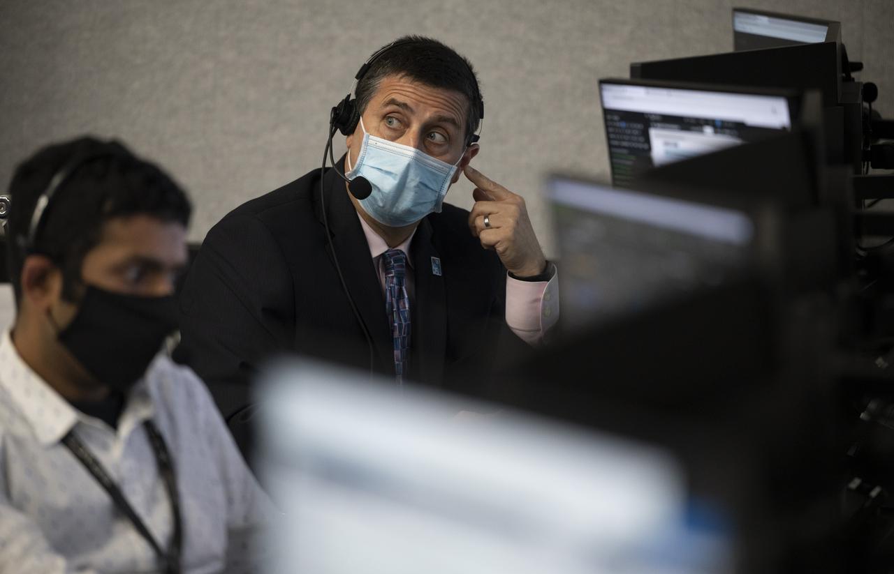 NASA International Space Station program manger Joel Montalbano monitors the countdown of the launch of a SpaceX Falcon 9 rocket carrying the company's Crew Dragon spacecraft on NASA’s SpaceX Crew-2 mission with NASA astronauts Shane Kimbrough and Megan McArthur, ESA (European Space Agency) astronaut Thomas Pesquet, and Japan Aerospace Exploration Agency (JAXA) astronaut Akihiko Hoshide onboard, Friday, April 23, 2021, in firing room four of the Launch Control Center at NASA’s Kennedy Space Center in Florida. NASA’s SpaceX Crew-2 mission is the second crew rotation mission of the SpaceX Crew Dragon spacecraft and Falcon 9 rocket to the International Space Station as part of the agency’s Commercial Crew Program. Kimbrough, McArthur, Pesquet, and Hoshide launched at 5:49 a.m. EDT, from Launch Complex 39A at the Kennedy Space Center. Photo Credit: (NASA/Joel Kowsky)
