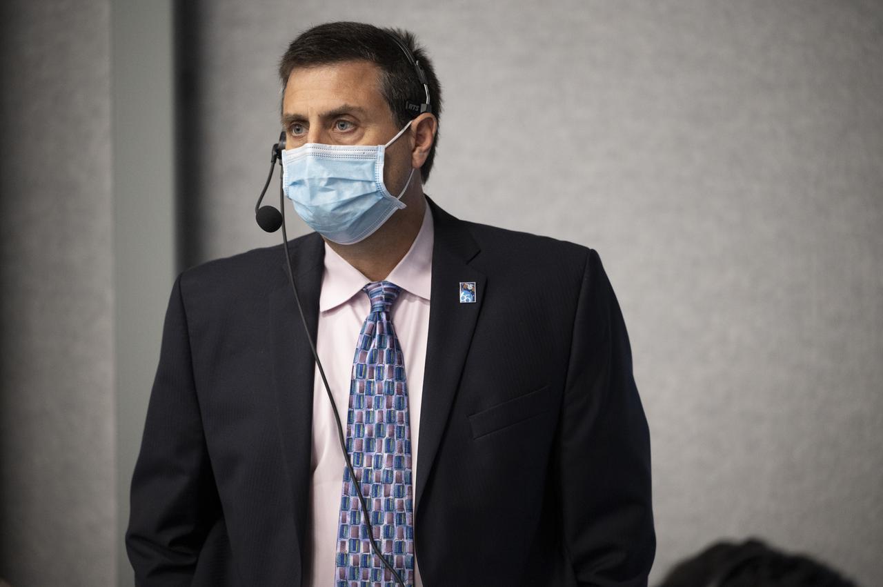 NASA International Space Station program manger Joel Montalbano monitors the countdown of the launch of a SpaceX Falcon 9 rocket carrying the company's Crew Dragon spacecraft on NASA’s SpaceX Crew-2 mission with NASA astronauts Shane Kimbrough and Megan McArthur, ESA (European Space Agency) astronaut Thomas Pesquet, and Japan Aerospace Exploration Agency (JAXA) astronaut Akihiko Hoshide onboard, Friday, April 23, 2021, in firing room four of the Launch Control Center at NASA’s Kennedy Space Center in Florida. NASA’s SpaceX Crew-2 mission is the second crew rotation mission of the SpaceX Crew Dragon spacecraft and Falcon 9 rocket to the International Space Station as part of the agency’s Commercial Crew Program. Kimbrough, McArthur, Pesquet, and Hoshide launched at 5:49 a.m. EDT, from Launch Complex 39A at the Kennedy Space Center. Photo Credit: (NASA/Joel Kowsky)