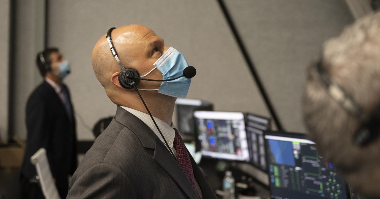 Michael Hess, operations integration manager for NASA's Commercial Crew Program, monitors the launch of a SpaceX Falcon 9 rocket carrying the company's Crew Dragon spacecraft on the Crew-2 mission with NASA astronauts Shane Kimbrough and Megan McArthur, ESA (European Space Agency) astronaut Thomas Pesquet, and Japan Aerospace Exploration Agency (JAXA) astronaut Akihiko Hoshide onboard, Friday, April 23, 2021, in  firing room four of the Launch Control Center at NASA’s Kennedy Space Center in Florida. NASA’s SpaceX Crew-2 mission is the second crew rotation mission of the SpaceX Crew Dragon spacecraft and Falcon 9 rocket to the International Space Station as part of the agency’s Commercial Crew Program. Kimbrough, McArthur, Pesquet, and Hoshide launched at 5:49 a.m. EDT, from Launch Complex 39A at the Kennedy Space Center. Photo Credit: (NASA/Joel Kowsky)