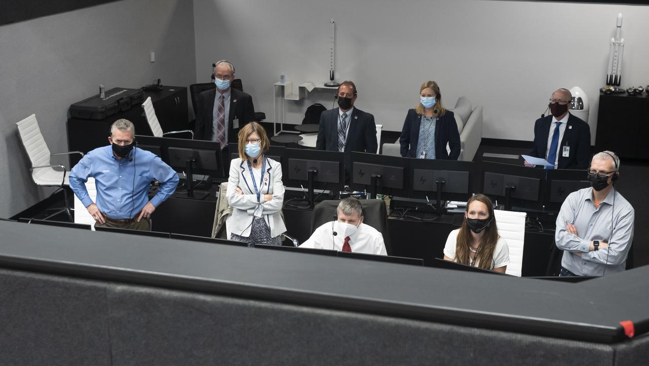 NASA and SpaceX management monitor the launch of a SpaceX Falcon 9 rocket carrying the company's Crew Dragon spacecraft on the Crew-2 mission with NASA astronauts Shane Kimbrough and Megan McArthur, ESA (European Space Agency) astronaut Thomas Pesquet, and Japan Aerospace Exploration Agency (JAXA) astronaut Akihiko Hoshide onboard, Friday, April 23, 2021, in  firing room four of the Launch Control Center at NASA’s Kennedy Space Center in Florida. NASA’s SpaceX Crew-2 mission is the second crew rotation mission of the SpaceX Crew Dragon spacecraft and Falcon 9 rocket to the International Space Station as part of the agency’s Commercial Crew Program. Kimbrough, McArthur, Pesquet, and Hoshide launched at 5:49 a.m. EDT, from Launch Complex 39A at the Kennedy Space Center. Photo Credit: (NASA/Joel Kowsky)