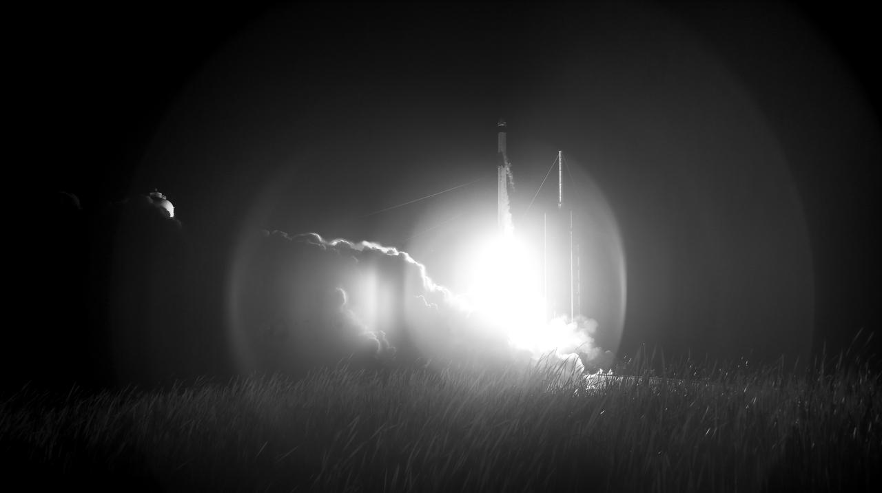 In this black and white infrared image, a SpaceX Falcon 9 rocket carrying the company's Crew Dragon spacecraft is launched on NASA’s SpaceX Crew-2 mission to the International Space Station with NASA astronauts Shane Kimbrough and Megan McArthur, ESA (European Space Agency) astronaut Thomas Pesquet, and Japan Aerospace Exploration Agency (JAXA) astronaut Akihiko Hoshide onboard, Friday, April 23, 2021, at NASA’s Kennedy Space Center in Florida. NASA’s SpaceX Crew-2 mission is the second crew rotation mission of the SpaceX Crew Dragon spacecraft and Falcon 9 rocket to the International Space Station as part of the agency’s Commercial Crew Program. Kimbrough, McArthur, Pesquet, and Hoshide launched at 5:49 a.m. EDT from Launch Complex 39A at the Kennedy Space Center to begin a six month mission onboard the orbital outpost. Photo Credit: (NASA/Joel Kowsky)
