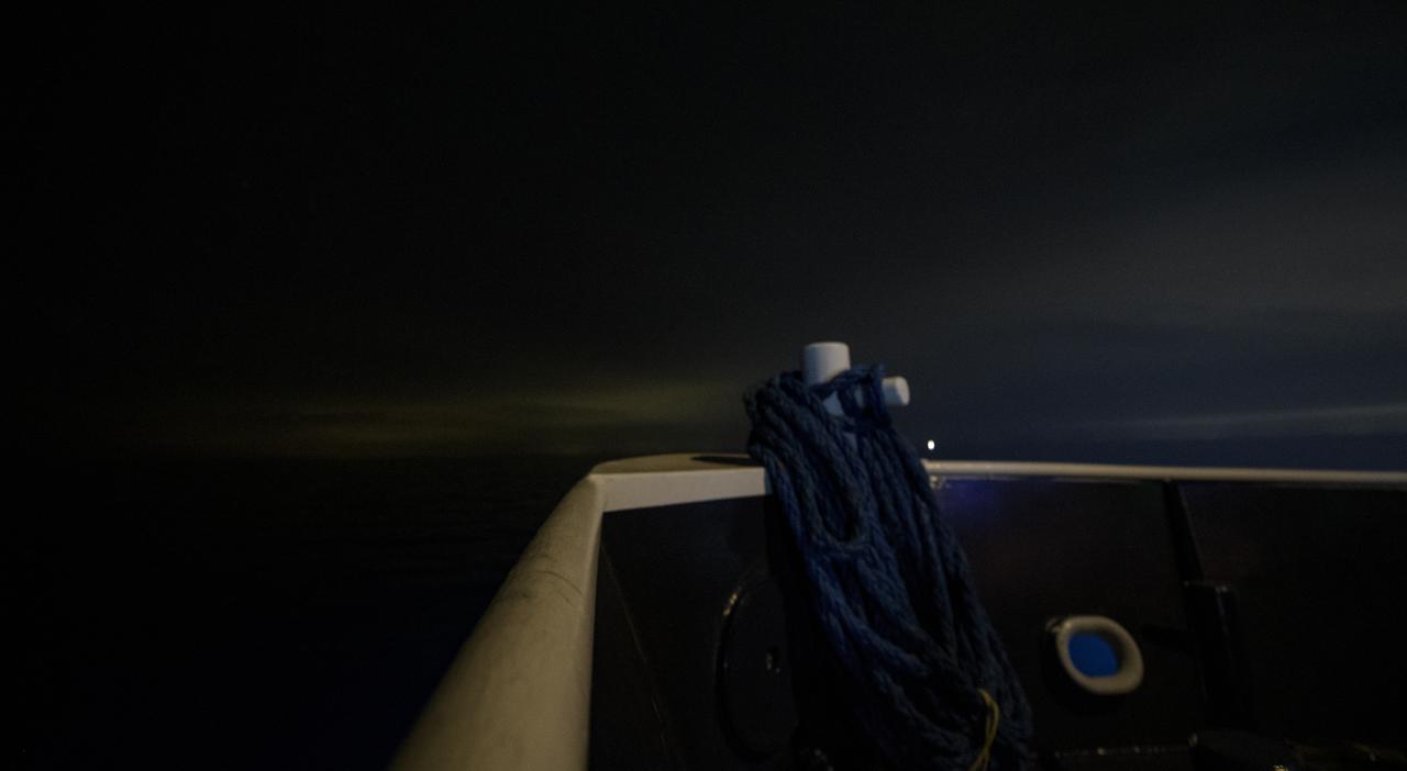 The night sky off the bow of the SpaceX GO Navigator recovery ship is seen in this one second exposure photograph as NASA and SpaceX support teams prepare for the landing of the SpaceX Crew Dragon Resilience spacecraft with NASA astronauts Mike Hopkins, Shannon Walker, and Victor Glover, and Japan Aerospace Exploration Agency (JAXA) astronaut Soichi Noguchi aboard in the Gulf of Mexico off the coast of Panama City, Florida, Saturday, May 1, 2021. NASA’s SpaceX Crew-1 mission is the first crew rotation flight of the SpaceX Crew Dragon spacecraft and Falcon 9 rocket with astronauts to the International Space Station as part of the agency’s Commercial Crew Program. Photo Credit: (NASA/Bill Ingalls)