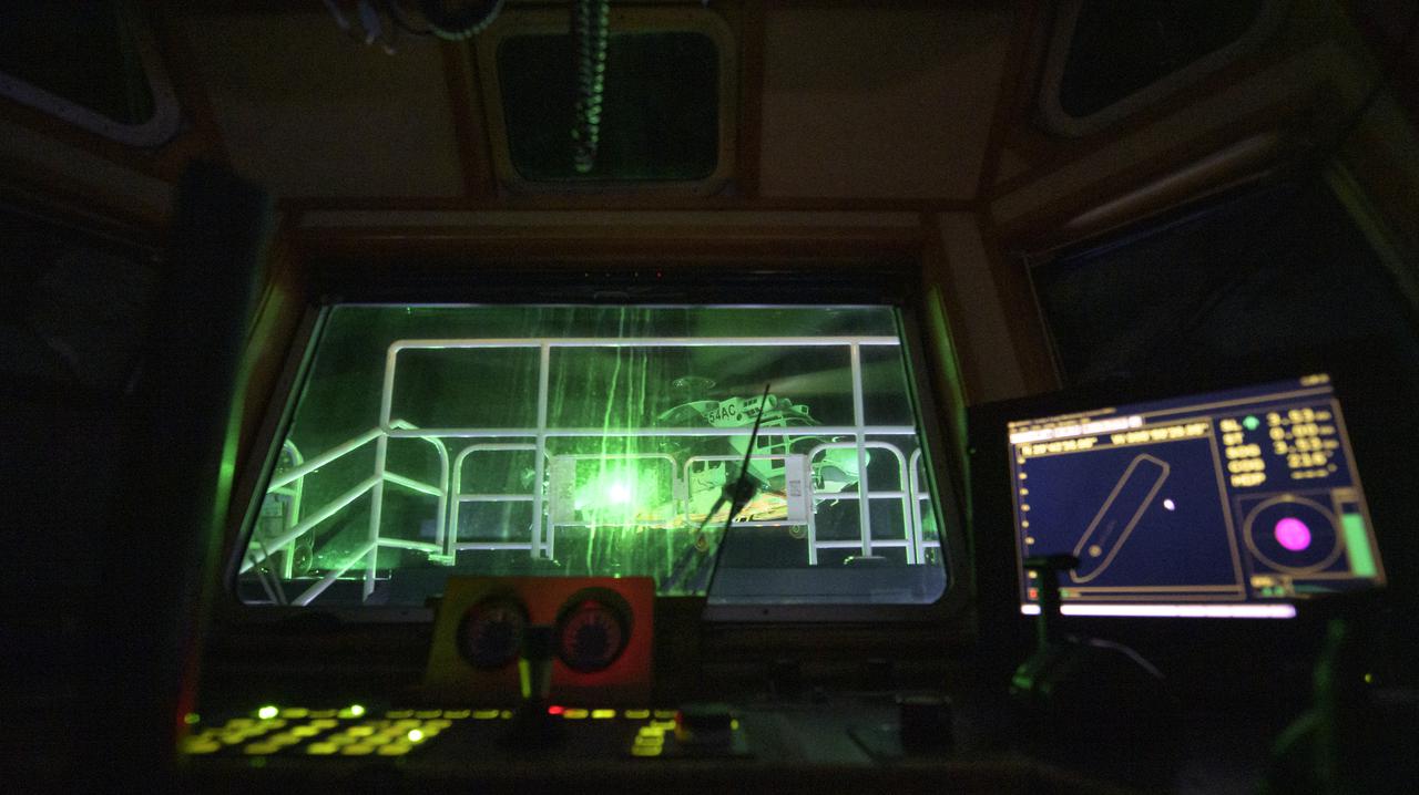 NASA and SpaceX support teams arrive via helicopter to the SpaceX GO Navigator recovery ship in order to prepare for the landing of the SpaceX Crew Dragon Resilience spacecraft with NASA astronauts Mike Hopkins, Shannon Walker, and Victor Glover, and Japan Aerospace Exploration Agency (JAXA) astronaut Soichi Noguchi aboard in the Gulf of Mexico off the coast of Panama City, Florida, Saturday, May 1, 2021. NASA’s SpaceX Crew-1 mission is the first crew rotation flight of the SpaceX Crew Dragon spacecraft and Falcon 9 rocket with astronauts to the International Space Station as part of the agency’s Commercial Crew Program. Photo Credit: (NASA/Bill Ingalls)
