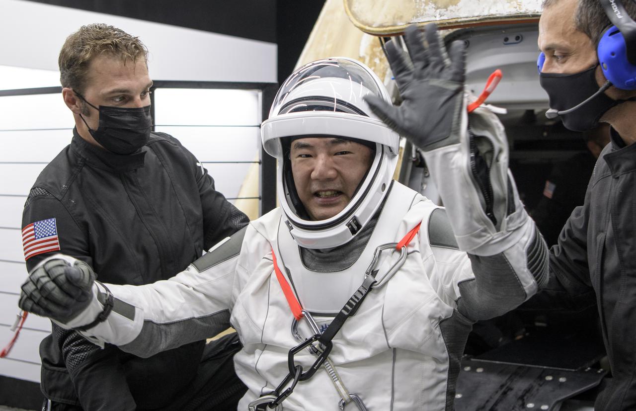 Japan Aerospace Exploration Agency (JAXA) astronaut Soichi Noguchi is helped out of the SpaceX Crew Dragon Resilience spacecraft onboard the SpaceX GO Navigator recovery ship after he, NASA astronauts Mike Hopkins, Shannon Walker, and Victor Glover, landed in the Gulf of Mexico off the coast of Panama City, Florida, Sunday, May 2, 2021. NASA’s SpaceX Crew-1 mission was the first crew rotation flight of the SpaceX Crew Dragon spacecraft and Falcon 9 rocket with astronauts to the International Space Station as part of the agency’s Commercial Crew Program. Photo Credit: (NASA/Bill Ingalls)