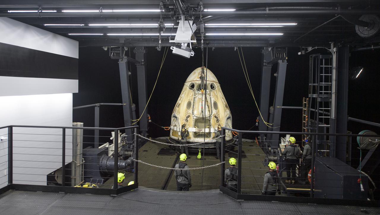 Support teams work around the SpaceX Crew Dragon Resilience spacecraft shortly after it landed with NASA astronauts Mike Hopkins, Shannon Walker, and Victor Glover, and Japan Aerospace Exploration Agency (JAXA) astronaut Soichi Noguchi aboard in the Gulf of Mexico off the coast of Panama City, Florida, Sunday, May 2, 2021.  NASA’s SpaceX Crew-1 mission was the first crew rotation flight of the SpaceX Crew Dragon spacecraft and Falcon 9 rocket with astronauts to the International Space Station as part of the agency’s Commercial Crew Program. Photo Credit: (NASA/Bill Ingalls)