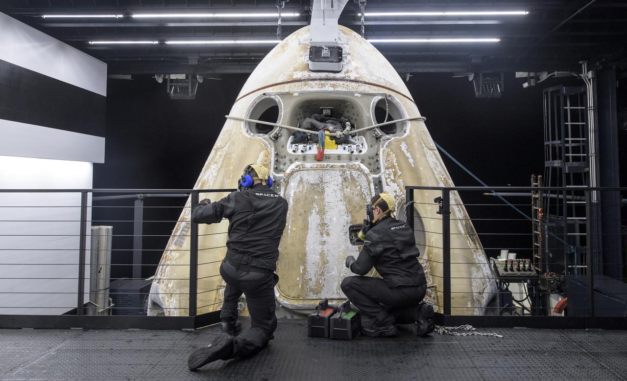 Support teams work around the SpaceX Crew Dragon Resilience spacecraft shortly after it landed with NASA astronauts Mike Hopkins, Shannon Walker, and Victor Glover, and Japan Aerospace Exploration Agency (JAXA) astronaut Soichi Noguchi aboard in the Gulf of Mexico off the coast of Panama City, Florida, Sunday, May 2, 2021.  NASA’s SpaceX Crew-1 mission was the first crew rotation flight of the SpaceX Crew Dragon spacecraft and Falcon 9 rocket with astronauts to the International Space Station as part of the agency’s Commercial Crew Program. Photo Credit: (NASA/Bill Ingalls)