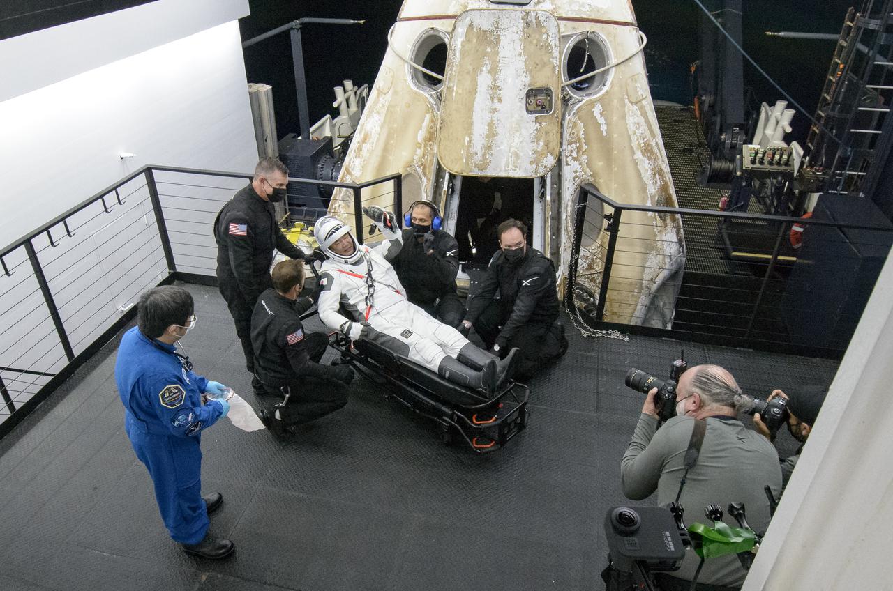 Japan Aerospace Exploration Agency (JAXA) astronaut Soichi Noguchi gives a thumbs up after he is helped out of the SpaceX Crew Dragon Resilience spacecraft onboard the SpaceX GO Navigator recovery ship after he, NASA astronauts Mike Hopkins, Shannon Walker and Victor Glover, landed in the Gulf of Mexico off the coast of Panama City, Florida, Sunday, May 2, 2021. NASA’s SpaceX Crew-1 mission was the first crew rotation flight of the SpaceX Crew Dragon spacecraft and Falcon 9 rocket with astronauts to the International Space Station as part of the agency’s Commercial Crew Program. Photo Credit: (NASA/Bill Ingalls)