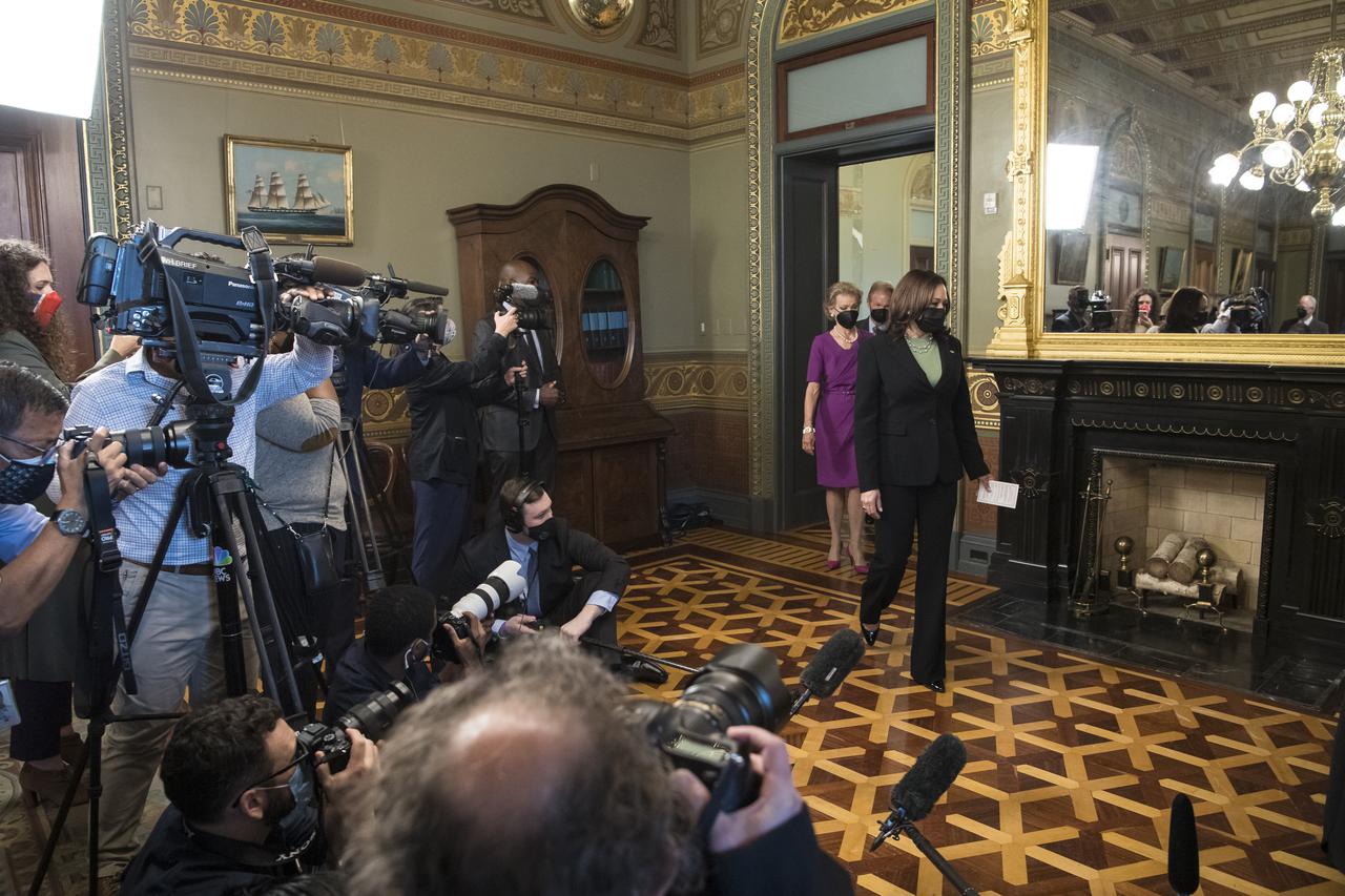 Vice President Kamala Harris walks into the Ceremonial Office in the Old Executive Office Building, followed by Grace Nelson, and her husband, former Senator Bill Nelson, to ceremonially swear him in as the 14th NASA Administrator, Monday, May 3, 2021, in Washington. A moon rock collected by astronaut John Young during the Apollo 16 mission was on display and former NASA Administrators Jim Bridenstine (virtually on laptop) and Charles Bolden were also present. Photo Credit: (NASA/Aubrey Gemignani)