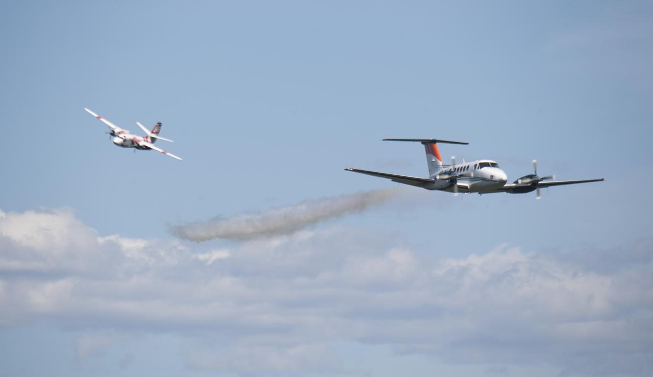 A Cal Fire S2-T airtanker follows a U.S. Forest Service King Air 200 during an aerial attack on a simulated wildfire, Tuesday, May 4, 2021 as Cal Fire conducts aerial fire fighting training exercises near Redding, California. STEReO, the Scalable Traffic Management for Emergency Response Operations project, led by NASA’s Ames Research Center, builds on NASA’s expertise in air traffic management, human factors research, and autonomous technology development to apply the agency’s work in Unmanned Aircraft Systems Traffic Management, or UTM, to public safety uses. Photo Credit: (NASA/Joel Kowsky)