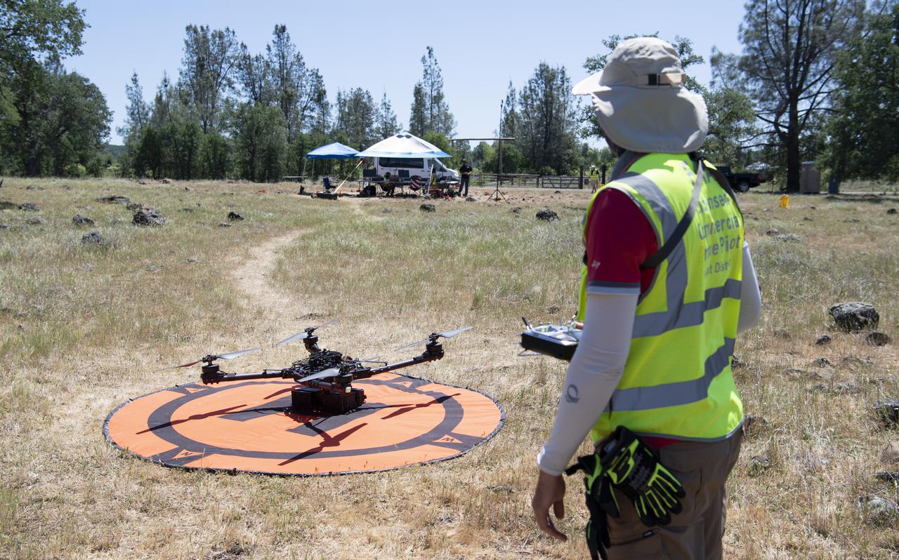 Jonas Jonsson, pilot in command for STEReO, the Scalable Traffic Management for Emergency Response Operations project, at NASA's Ames Research Center, is seen prior to the flight of a FreeFly Systems Alta X drone as part of STEReO test activities, Tuesday, May 4, 2021, as Cal Fire conducts aerial fire fighting training exercises near Redding, California. STEReO, the Scalable Traffic Management for Emergency Response Operations project, led by NASA’s Ames Research Center, builds on NASA’s expertise in air traffic management, human factors research, and autonomous technology development to apply the agency’s work in Unmanned Aircraft Systems Traffic Management, or UTM, to public safety uses. Photo Credit: (NASA/Joel Kowsky)