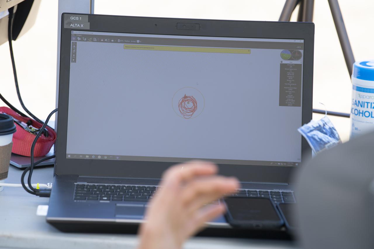 A laptop displays the flight path of a FreeFly Systems Alta X drone during STEReO, the Scalable Traffic Management for Emergency Response Operations project, field testing, Wednesday, May 5, 2021 as Cal Fire conducts aerial fire fighting training exercises near Redding, California.  STEReO, the Scalable Traffic Management for Emergency Response Operations project, led by NASA’s Ames Research Center, builds on NASA’s expertise in air traffic management, human factors research, and autonomous technology development to apply the agency’s work in Unmanned Aircraft Systems Traffic Management, or UTM, to public safety uses. Photo Credit: (NASA/Joel Kowsky)