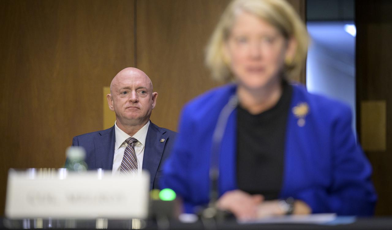 Sen. Mark Kelly, D-Ariz., listens after introducing Pam Melroy, President Biden’s nominee to be the next deputy administrator of NASA, during a Senate Committee on Commerce, Science, and Transportation confirmation hearing, Thursday, May 20, 2021, at the Hart Senate Office Building in Washington. Both Kelly and Melroy are former NASA astronauts. Photo Credit: (NASA/Bill Ingalls)