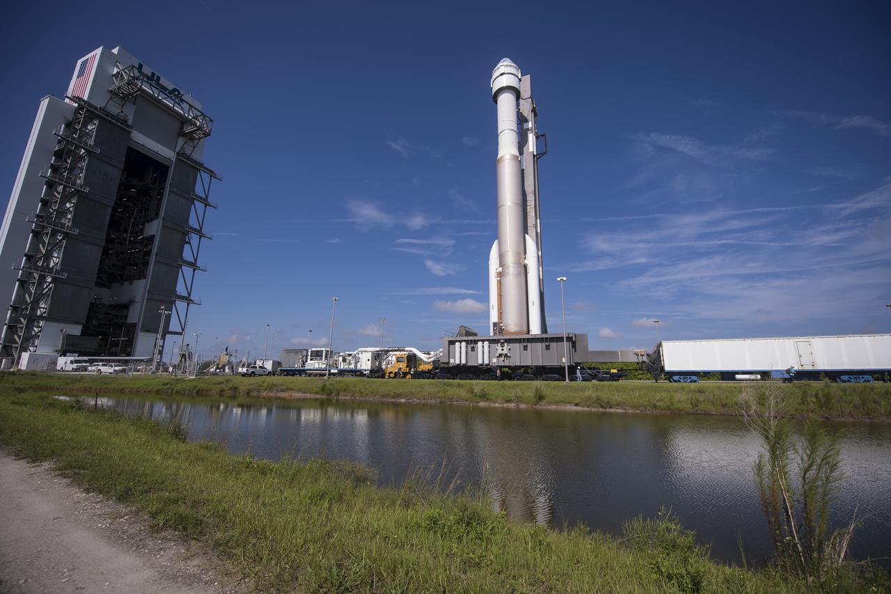 A United Launch Alliance Atlas V rocket with Boeing’s CST-100 Starliner spacecraft onboard is seen as it is rolled out of the Vertical Integration Facility to the launch pad at Space Launch Complex 41 ahead of the Orbital Flight Test-2 (OFT-2) mission, Thursday, July 29, 2021 at Cape Canaveral Space Force Station in Florida. Boeing’s Orbital Flight Test-2 will be Starliner’s second uncrewed flight test and will dock to the International Space Station as part of NASA's Commercial Crew Program. Photo Credit: (NASA/Aubrey Gemignani)