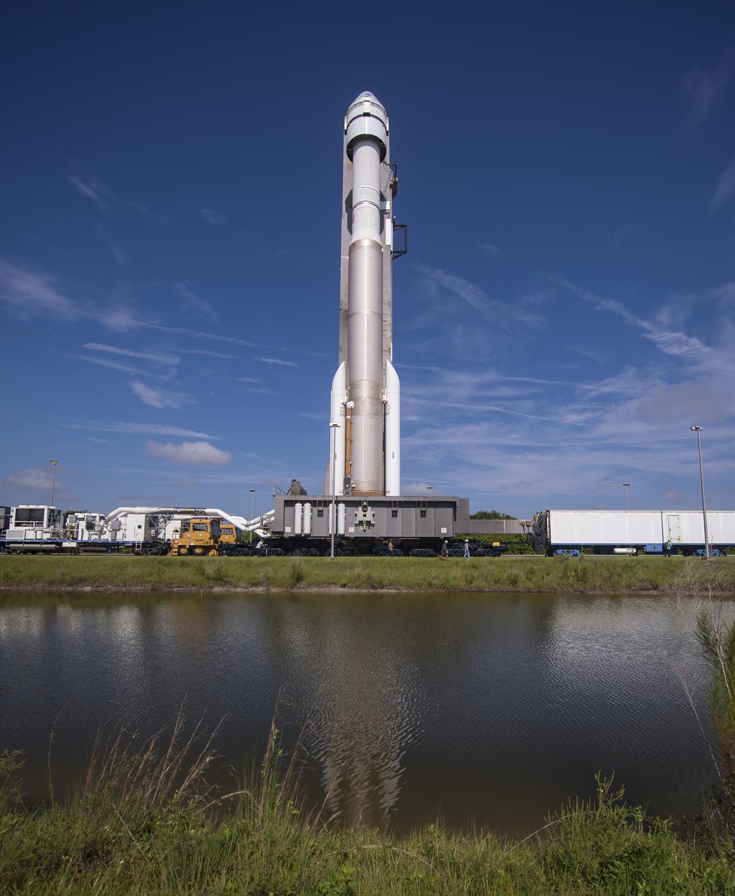 A United Launch Alliance Atlas V rocket with Boeing’s CST-100 Starliner spacecraft onboard is seen as it is rolled out of the Vertical Integration Facility to the launch pad at Space Launch Complex 41 ahead of the Orbital Flight Test-2 (OFT-2) mission, Thursday, July 29, 2021 at Cape Canaveral Space Force Station in Florida. Boeing’s Orbital Flight Test-2 will be Starliner’s second uncrewed flight test and will dock to the International Space Station as part of NASA's Commercial Crew Program. Photo Credit: (NASA/Aubrey Gemignani)