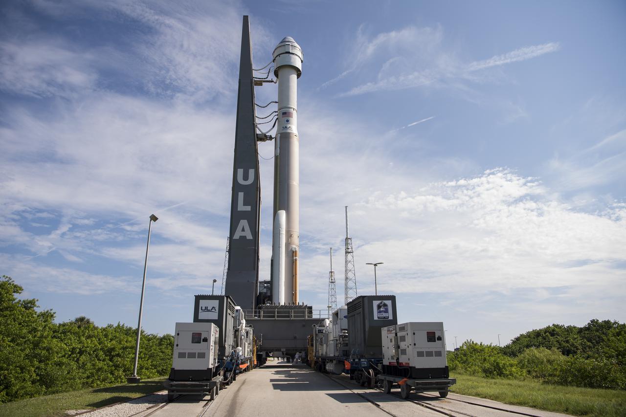 A United Launch Alliance Atlas V rocket with Boeing’s CST-100 Starliner spacecraft onboard is seen as it is rolled out of the Vertical Integration Facility to the launch pad at Space Launch Complex 41 ahead of the Orbital Flight Test-2 (OFT-2) mission, Thursday, July 29, 2021 at Cape Canaveral Space Force Station in Florida. Boeing’s Orbital Flight Test-2 will be Starliner’s second uncrewed flight test and will dock to the International Space Station as part of NASA's Commercial Crew Program. Photo Credit: (NASA/Aubrey Gemignani)