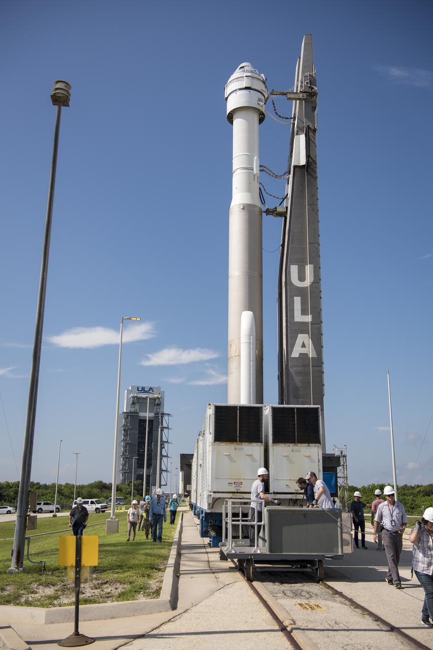 A United Launch Alliance Atlas V rocket with Boeing’s CST-100 Starliner spacecraft onboard is seen as it is rolled out of the Vertical Integration Facility to the launch pad at Space Launch Complex 41 ahead of the Orbital Flight Test-2 (OFT-2) mission, Thursday, July 29, 2021 at Cape Canaveral Space Force Station in Florida. Boeing’s Orbital Flight Test-2 will be Starliner’s second uncrewed flight test and will dock to the International Space Station as part of NASA's Commercial Crew Program. Photo Credit: (NASA/Aubrey Gemignani)