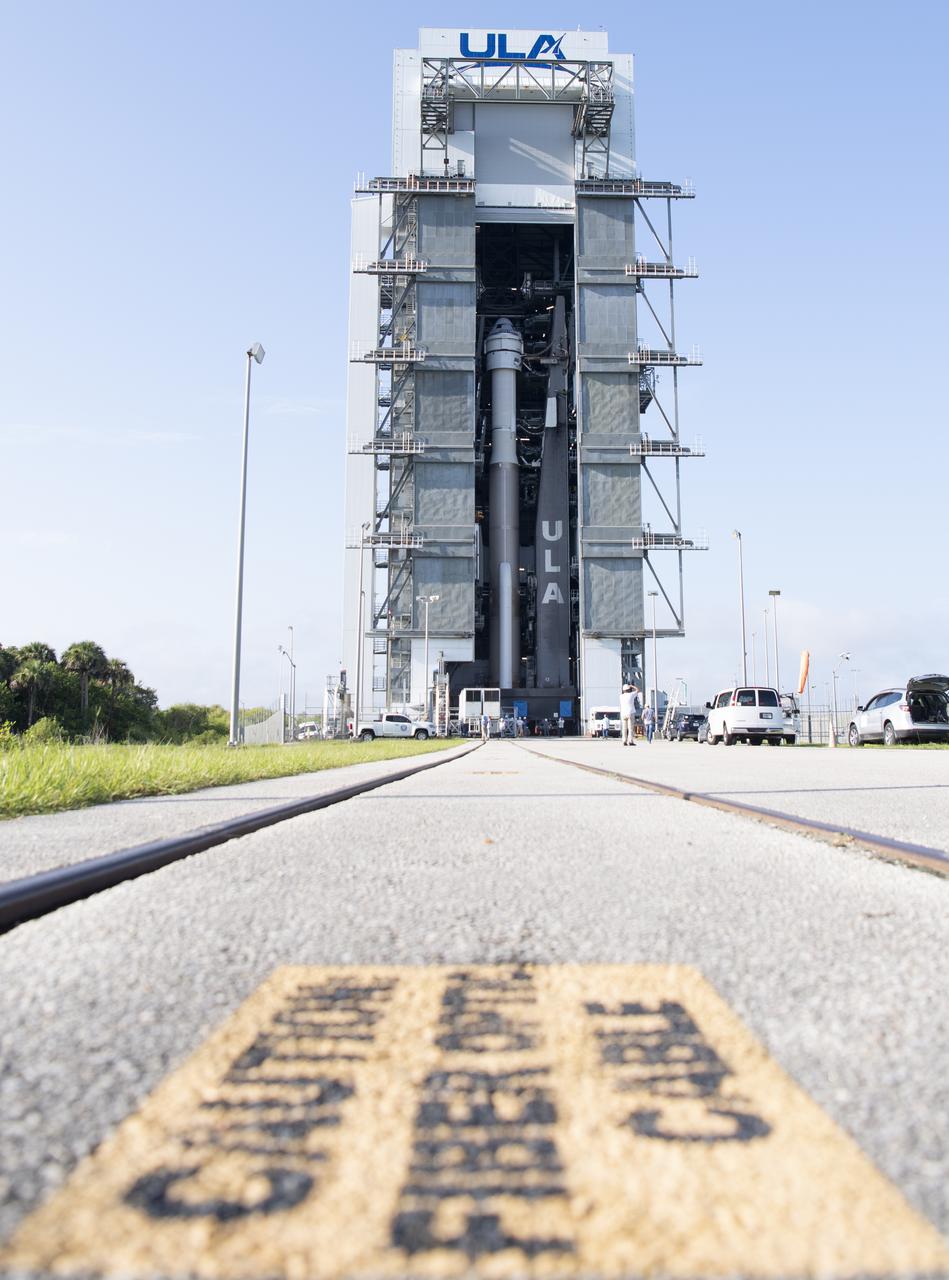 A United Launch Alliance Atlas V rocket with Boeing’s CST-100 Starliner spacecraft onboard is seen inside the Vertical Integration Facility prior to being rolled out to the launch pad at Space Launch Complex 41 ahead of the Orbital Flight Test-2 (OFT-2) mission, Thursday, July 29, 2021 at Cape Canaveral Space Force Station in Florida. Boeing’s Orbital Flight Test-2 will be Starliner’s second uncrewed flight test and will dock to the International Space Station as part of NASA's Commercial Crew Program. The mission, currently targeted for launch at 2:53 p.m. EDT Friday, July 30, will serve as an end-to-end test of the system's capabilities. Photo Credit: (NASA/Joel Kowsky)