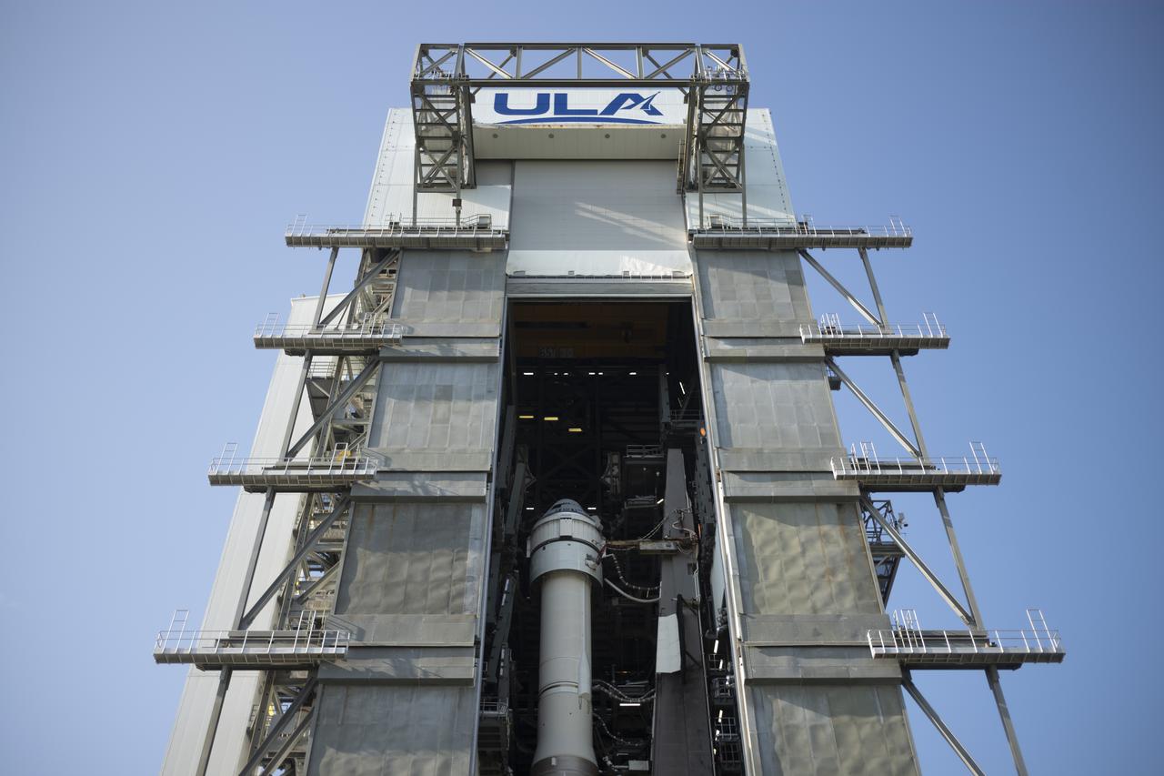 A United Launch Alliance Atlas V rocket with Boeing’s CST-100 Starliner spacecraft onboard is seen inside the Vertical Integration Facility prior to being rolled out to the launch pad at Space Launch Complex 41 ahead of the Orbital Flight Test-2 (OFT-2) mission, Thursday, July 29, 2021 at Cape Canaveral Space Force Station in Florida. Boeing’s Orbital Flight Test-2 will be Starliner’s second uncrewed flight test and will dock to the International Space Station as part of NASA's Commercial Crew Program. The mission, currently targeted for launch at 2:53 p.m. EDT Friday, July 30, will serve as an end-to-end test of the system's capabilities. Photo Credit: (NASA/Joel Kowsky)