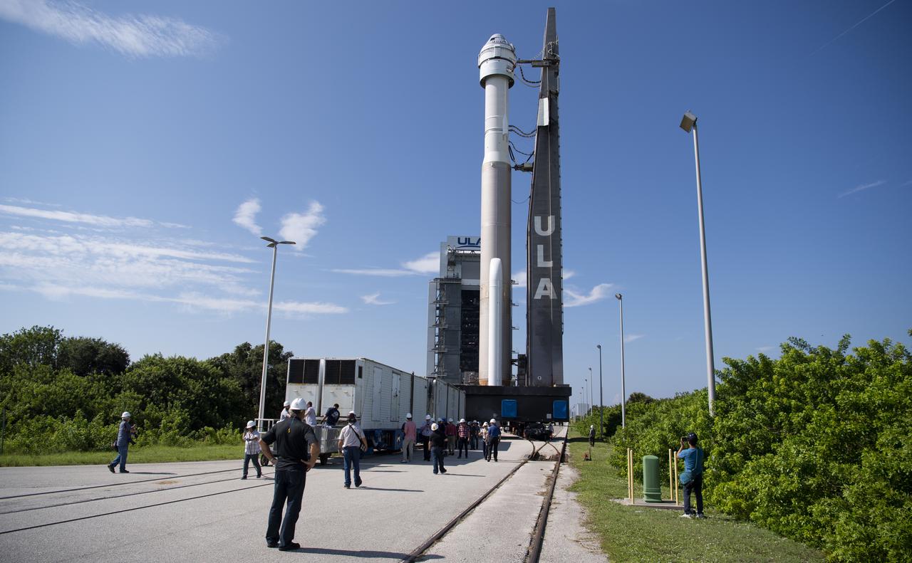 A United Launch Alliance Atlas V rocket with Boeing’s CST-100 Starliner spacecraft onboard is seen as it is rolled out of the Vertical Integration Facility to the launch pad at Space Launch Complex 41 ahead of the Orbital Flight Test-2 (OFT-2) mission, Thursday, July 29, 2021 at Cape Canaveral Space Force Station in Florida. Boeing’s Orbital Flight Test-2 will be Starliner’s second uncrewed flight test and will dock to the International Space Station as part of NASA's Commercial Crew Program. The mission, currently targeted for launch at 2:53 p.m. EDT Friday, July 30, will serve as an end-to-end test of the system's capabilities. Photo Credit: (NASA/Joel Kowsky)