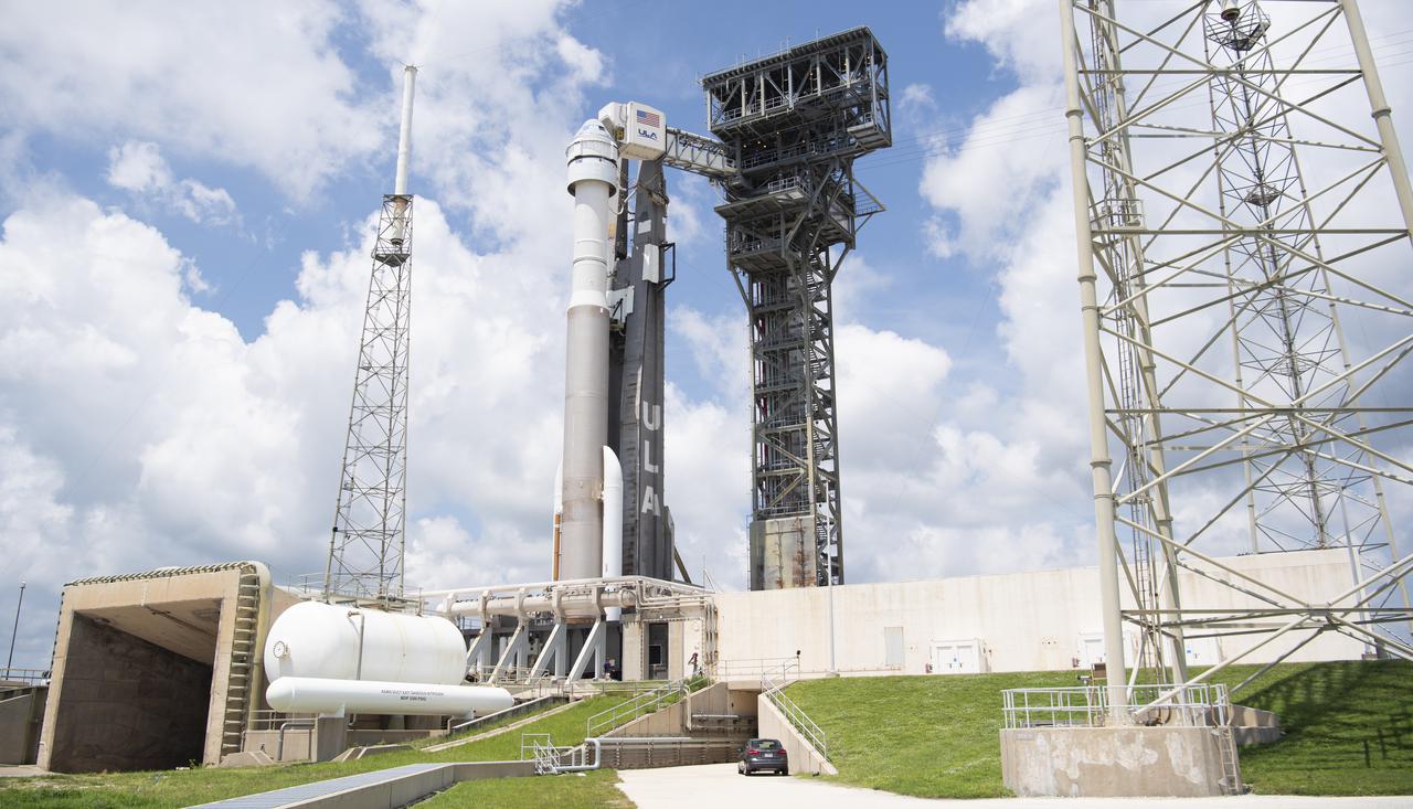 A United Launch Alliance Atlas V rocket with Boeing’s CST-100 Starliner spacecraft onboard is seen on the launch pad at Space Launch Complex 41 ahead of the Orbital Flight Test-2 (OFT-2) mission, Thursday, July 29, 2021 at Cape Canaveral Space Force Station in Florida. Boeing’s Orbital Flight Test-2 will be Starliner’s second uncrewed flight test and will dock to the International Space Station as part of NASA's Commercial Crew Program. The mission, currently targeted for launch at 2:53 p.m. EDT Friday, July 30, will serve as an end-to-end test of the system's capabilities. Photo Credit: (NASA/Joel Kowsky)