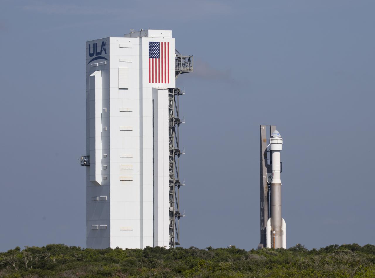 A United Launch Alliance Atlas V rocket with Boeing’s CST-100 Starliner spacecraft onboard is seen as it is rolled out of the Vertical Integration Facility to the launch pad at Space Launch Complex 41 ahead of the Orbital Flight Test-2 (OFT-2) mission, Thursday, July 29, 2021 at Cape Canaveral Space Force Station in Florida. Boeing’s Orbital Flight Test-2 will be Starliner’s second uncrewed flight test and will dock to the International Space Station as part of NASA's Commercial Crew Program. The mission will serve as an end-to-end test of the system's capabilities. Photo Credit: (NASA/Joel Kowsky)