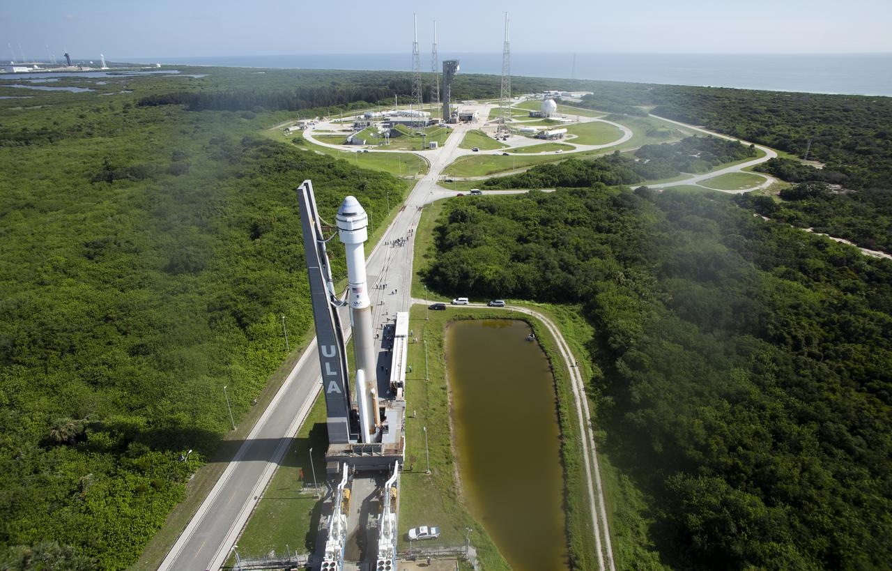 A United Launch Alliance Atlas V rocket with Boeing’s CST-100 Starliner spacecraft onboard is seen as it is rolled out of the Vertical Integration Facility to the launch pad at Space Launch Complex 41 ahead of the Orbital Flight Test-2 (OFT-2) mission, Thursday, July 29, 2021 at Cape Canaveral Space Force Station in Florida. Boeing’s Orbital Flight Test-2 will be Starliner’s second uncrewed flight test and will dock to the International Space Station as part of NASA's Commercial Crew Program. The mission will serve as an end-to-end test of the system's capabilities. Photo Credit: (NASA/Joel Kowsky)