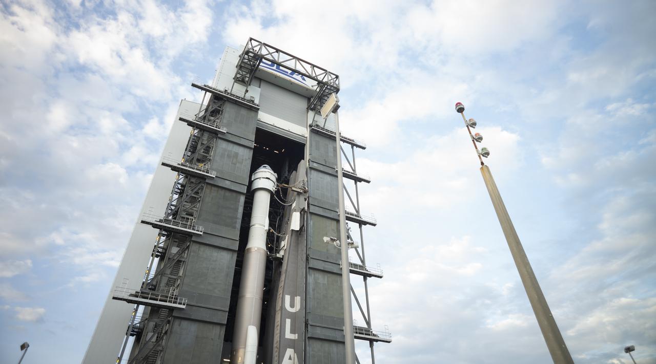 A United Launch Alliance Atlas V rocket with Boeing’s CST-100 Starliner spacecraft aboard is seen as it is rolled out of the Vertical Integration Facility to the launch pad at Space Launch Complex 41 ahead of the Orbital Flight Test-2 (OFT-2) mission, Monday, Aug. 2, 2021 at Cape Canaveral Space Force Station in Florida. Boeing’s Orbital Flight Test-2 will be Starliner’s second uncrewed flight test and will dock to the International Space Station as part of NASA's Commercial Crew Program. The mission, currently targeted for launch at 1:20 p.m. EDT Tuesday, Aug. 3, will serve as an end-to-end test of the system's capabilities. Photo Credit: (NASA/Joel Kowsky)
