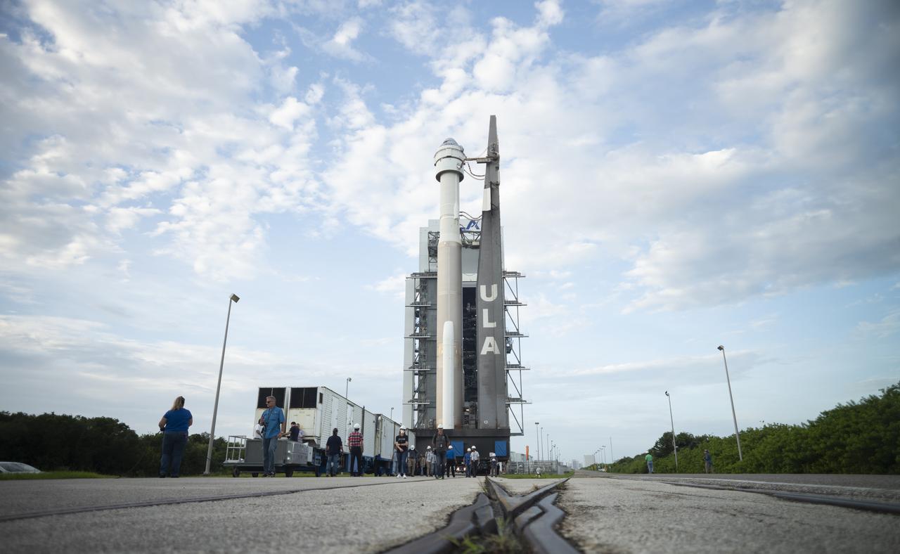 A United Launch Alliance Atlas V rocket with Boeing’s CST-100 Starliner spacecraft aboard is seen as it is rolled out of the Vertical Integration Facility to the launch pad at Space Launch Complex 41 ahead of the Orbital Flight Test-2 (OFT-2) mission, Monday, Aug. 2, 2021 at Cape Canaveral Space Force Station in Florida. Boeing’s Orbital Flight Test-2 will be Starliner’s second uncrewed flight test and will dock to the International Space Station as part of NASA's Commercial Crew Program. The mission, currently targeted for launch at 1:20 p.m. EDT Tuesday, Aug. 3, will serve as an end-to-end test of the system's capabilities. Photo Credit: (NASA/Joel Kowsky)