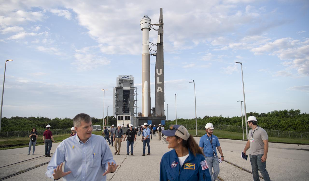 Steve Stich, manager of NASA’s Commercial Crew Program, left, and NASA astronaut Suni Williams are seen as a United Launch Alliance Atlas V rocket with Boeing’s CST-100 Starliner spacecraft aboard is seen as it is rolled out of the Vertical Integration Facility to the launch pad at Space Launch Complex 41 ahead of the Orbital Flight Test-2 (OFT-2) mission, Monday, Aug. 2, 2021 at Cape Canaveral Space Force Station in Florida. Boeing’s Orbital Flight Test-2 will be Starliner’s second uncrewed flight test and will dock to the International Space Station as part of NASA's Commercial Crew Program. The mission, currently targeted for launch at 1:20 p.m. EDT Tuesday, Aug. 3, will serve as an end-to-end test of the system's capabilities. Williams is scheduled to fly aboard Starliner’s first crew rotation mission. Photo Credit: (NASA/Joel Kowsky)