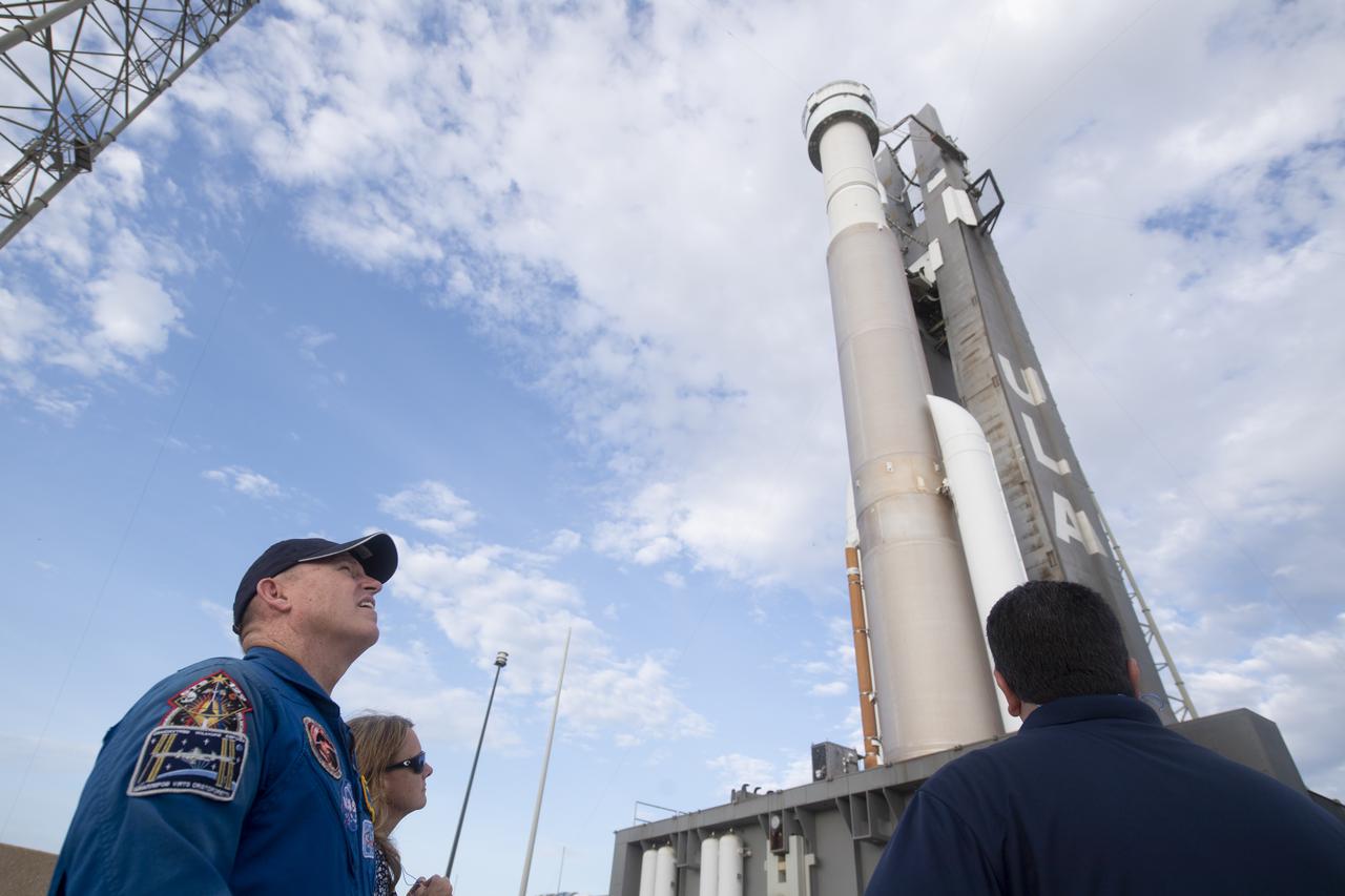 NASA astronaut Barry “Butch" Wilmore watches as a United Launch Alliance Atlas V rocket with Boeing’s CST-100 Starliner spacecraft aboard is seen as it is rolled out of the Vertical Integration Facility to the launch pad at Space Launch Complex 41 ahead of the Orbital Flight Test-2 (OFT-2) mission, Monday, Aug. 2, 2021 at Cape Canaveral Space Force Station in Florida. Boeing’s Orbital Flight Test-2 will be Starliner’s second uncrewed flight test and will dock to the International Space Station as part of NASA's Commercial Crew Program. The mission, currently targeted for launch at 1:20 p.m. EDT Tuesday, Aug. 3, will serve as an end-to-end test of the system's capabilities. Wilmore is scheduled to fly aboard Starliner’s Crewed Flight Test mission. Photo Credit: (NASA/Joel Kowsky)