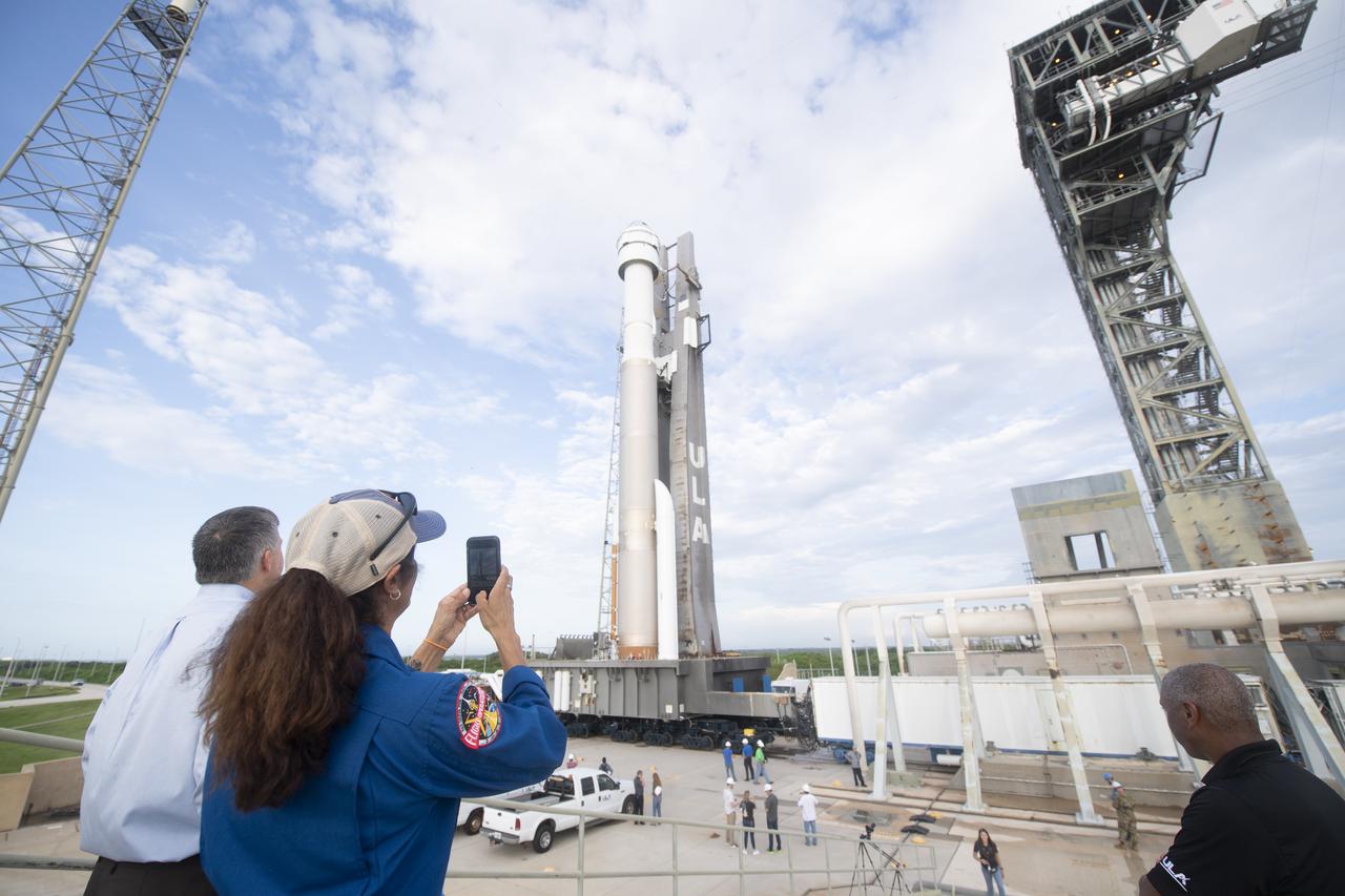 Steve Stich, manager of NASA’s Commercial Crew Program, left, and NASA astronaut Suni Williams are seen as a United Launch Alliance Atlas V rocket with Boeing’s CST-100 Starliner spacecraft aboard is seen as it is rolled out of the Vertical Integration Facility to the launch pad at Space Launch Complex 41 ahead of the Orbital Flight Test-2 (OFT-2) mission, Monday, Aug. 2, 2021 at Cape Canaveral Space Force Station in Florida. Boeing’s Orbital Flight Test-2 will be Starliner’s second uncrewed flight test and will dock to the International Space Station as part of NASA's Commercial Crew Program. The mission, currently targeted for launch at 1:20 p.m. EDT Tuesday, Aug. 3, will serve as an end-to-end test of the system's capabilities. Williams is scheduled to fly aboard Starliner’s first crew rotation mission. Photo Credit: (NASA/Joel Kowsky)