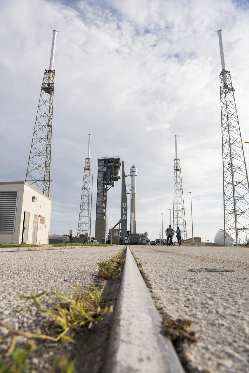 A United Launch Alliance Atlas V rocket with Boeing’s CST-100 Starliner spacecraft aboard is seen on the launch pad after it was rolled out of the Vertical Integration Facility to the launch pad at Space Launch Complex 41 ahead of the Orbital Flight Test-2 (OFT-2) mission, Monday, Aug. 2, 2021 at Cape Canaveral Space Force Station in Florida. Boeing’s Orbital Flight Test-2 will be Starliner’s second uncrewed flight test and will dock to the International Space Station as part of NASA's Commercial Crew Program. The mission, currently targeted for launch at 1:20 p.m. EDT Tuesday, Aug. 3, will serve as an end-to-end test of the system's capabilities. Photo Credit: (NASA/Aubrey Gemignani)
