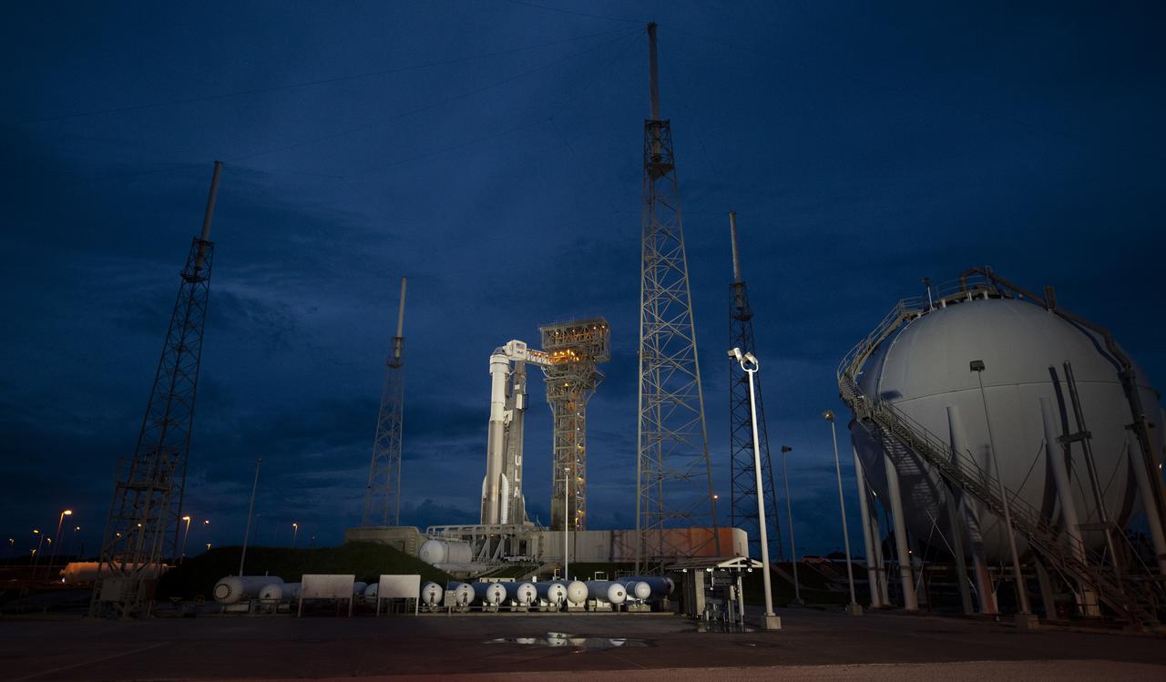 A United Launch Alliance Atlas V rocket with Boeing’s CST-100 Starliner spacecraft aboard is seen illuminated by spotlights on the launch pad at Space Launch Complex 41 ahead of the Orbital Flight Test-2 mission, Monday, Aug. 2, 2021 at Cape Canaveral Space Force Station in Florida. Boeing’s Orbital Flight Test-2 will be Starliner’s second uncrewed flight test and will dock to the International Space Station as part of NASA's Commercial Crew Program. The mission, currently targeted for launch on 1:20 p.m. EDT Tuesday, Aug. 3, will serve as an end-to-end test of the system's capabilities. Photo Credit: (NASA/Joel Kowsky)