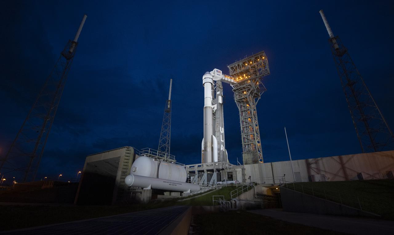 A United Launch Alliance Atlas V rocket with Boeing’s CST-100 Starliner spacecraft aboard is seen illuminated by spotlights on the launch pad at Space Launch Complex 41 ahead of the Orbital Flight Test-2 mission, Monday, Aug. 2, 2021 at Cape Canaveral Space Force Station in Florida. Boeing’s Orbital Flight Test-2 will be Starliner’s second uncrewed flight test and will dock to the International Space Station as part of NASA's Commercial Crew Program. The mission, currently targeted for launch on 1:20 p.m. EDT Tuesday, Aug. 3, will serve as an end-to-end test of the system's capabilities. Photo Credit: (NASA/Joel Kowsky)