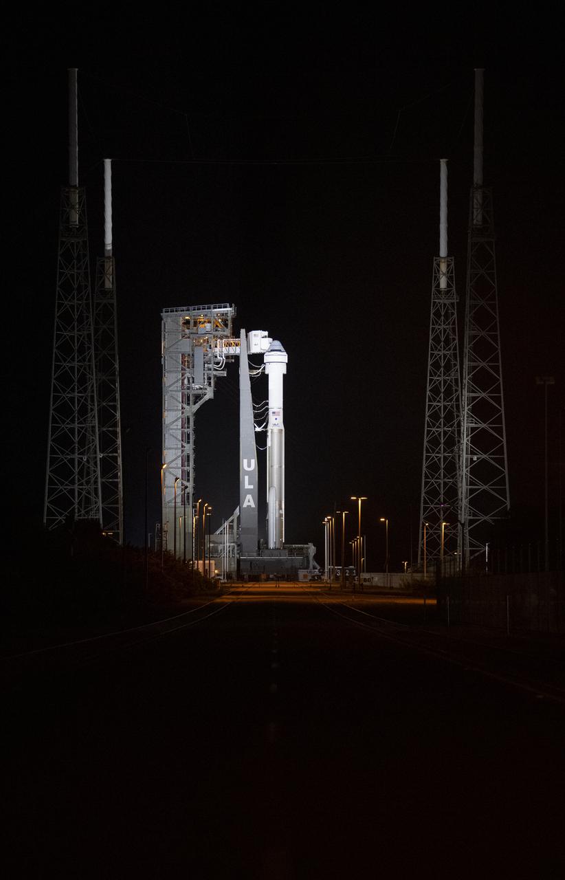 A United Launch Alliance Atlas V rocket with Boeing’s CST-100 Starliner spacecraft aboard is seen illuminated by spotlights on the launch pad at Space Launch Complex 41 ahead of the Orbital Flight Test-2 mission, Monday, Aug. 2, 2021 at Cape Canaveral Space Force Station in Florida. Boeing’s Orbital Flight Test-2 will be Starliner’s second uncrewed flight test and will dock to the International Space Station as part of NASA's Commercial Crew Program. The mission, currently targeted for launch on 1:20 p.m. EDT Tuesday, Aug. 3, will serve as an end-to-end test of the system's capabilities. Photo Credit: (NASA/Joel Kowsky)