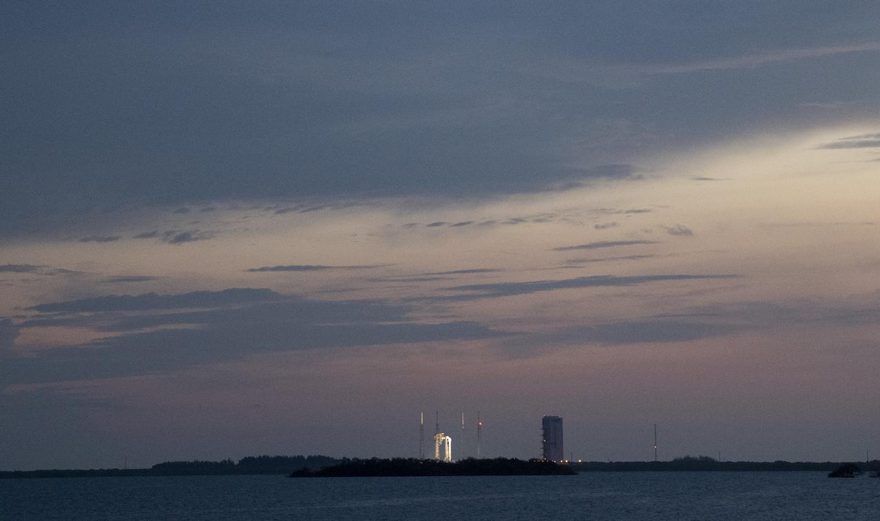 A United Launch Alliance Atlas V rocket with Boeing’s CST-100 Starliner spacecraft aboard is seen at sunrise on the launch pad at Space Launch Complex 41 ahead of the Orbital Flight Test-2 mission, Tuesday, Aug. 3, 2021 at Cape Canaveral Space Force Station in Florida. Boeing’s Orbital Flight Test-2 will be Starliner’s second uncrewed flight test and will dock to the International Space Station as part of NASA's Commercial Crew Program. The mission, currently targeted for launch at 1:20 p.m. EDT, will serve as an end-to-end test of the system's capabilities. Photo Credit: (NASA/Joel Kowsky)