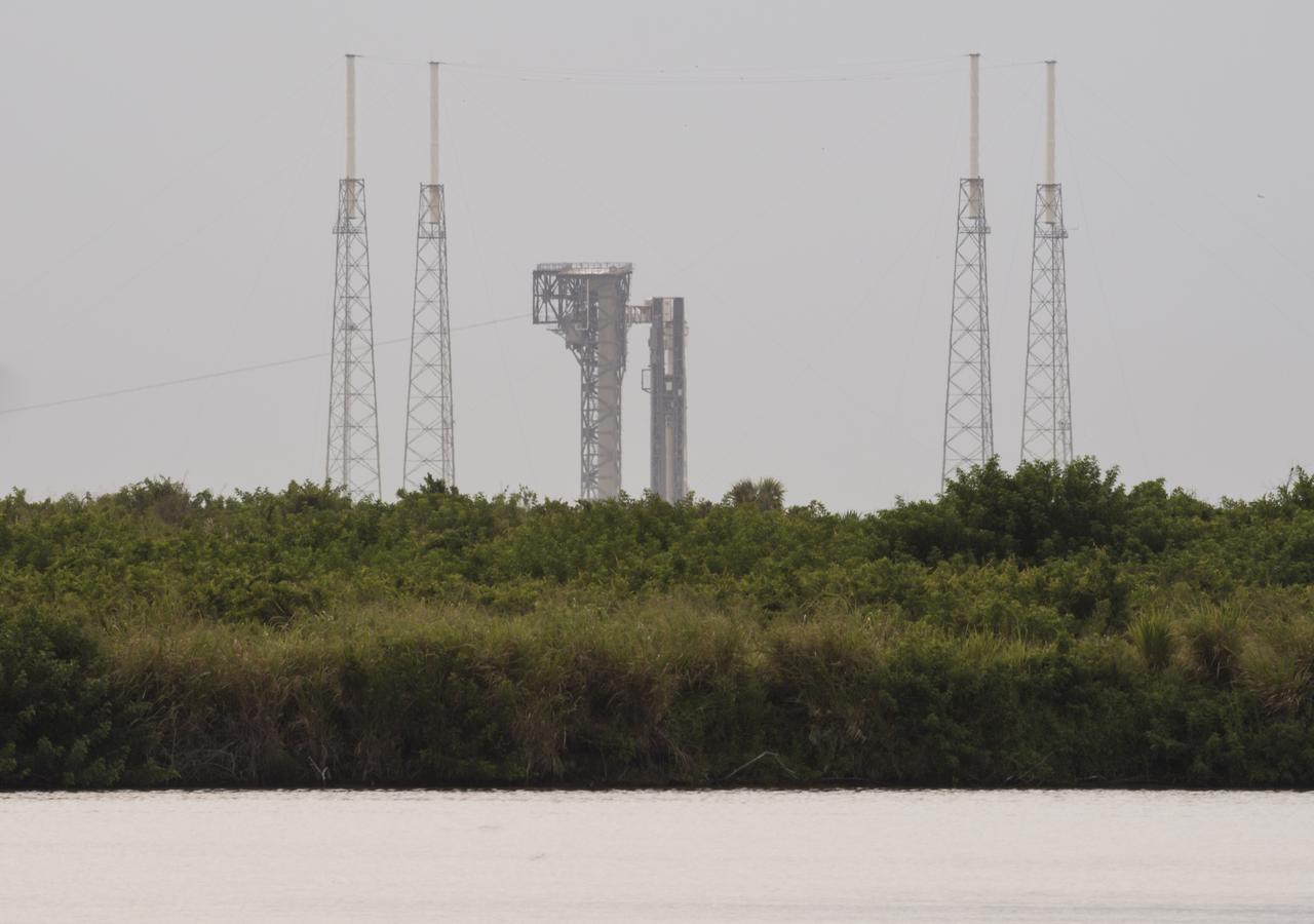 A United Launch Alliance Atlas V rocket with Boeing’s CST-100 Starliner spacecraft aboard is seen at sunrise on the launch pad at Space Launch Complex 41 ahead of the Orbital Flight Test-2 mission, Tuesday, Aug. 3, 2021 at Cape Canaveral Space Force Station in Florida. Boeing’s Orbital Flight Test-2 will be Starliner’s second uncrewed flight test and will dock to the International Space Station as part of NASA's Commercial Crew Program. The mission, currently targeted for launch at 1:20 p.m. EDT, will serve as an end-to-end test of the system's capabilities. Photo Credit: (NASA/Aubrey Gemignani)
