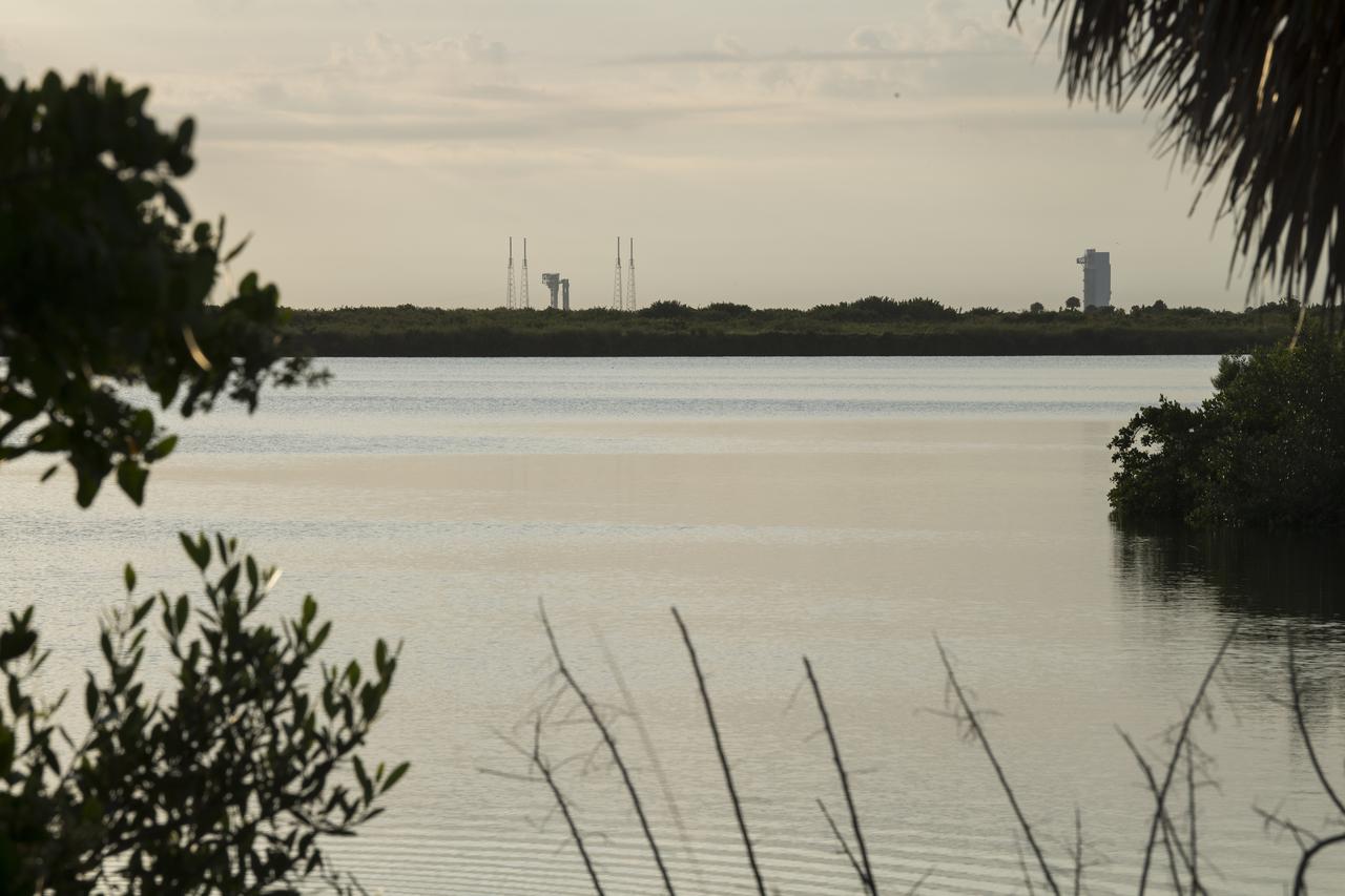 A United Launch Alliance Atlas V rocket with Boeing’s CST-100 Starliner spacecraft aboard is seen at sunrise on the launch pad at Space Launch Complex 41 ahead of the Orbital Flight Test-2 mission, Tuesday, Aug. 3, 2021 at Cape Canaveral Space Force Station in Florida. Boeing’s Orbital Flight Test-2 will be Starliner’s second uncrewed flight test and will dock to the International Space Station as part of NASA's Commercial Crew Program. The mission, currently targeted for launch at 1:20 p.m. EDT, will serve as an end-to-end test of the system's capabilities. Photo Credit: (NASA/Aubrey Gemignani)
