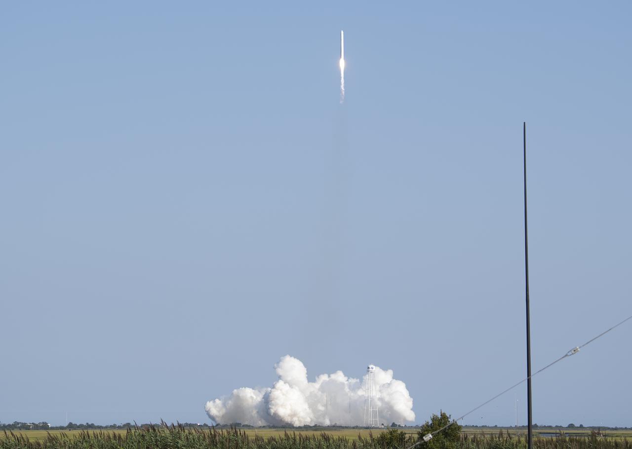 A Northrop Grumman Antares rocket carrying a Cygnus resupply spacecraft launches from  Pad-0A of the Mid-Atlantic Regional Spaceport, Tuesday, Aug. 10, 2021, at NASA's Wallops Flight Facility in Virginia. Northrop Grumman’s 16th contracted cargo resupply mission with NASA will deliver nearly 8,200 pounds of science and research, crew supplies and vehicle hardware to the International Space Station and its crew.  Photo Credit: (NASA/Joel Kowsky}