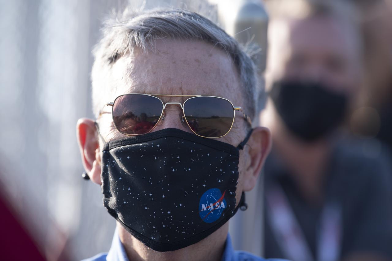 Bob Cabana, NASA associate administrator, watches the launch of a Northrop Grumman Antares rocket carrying a Cygnus resupply spacecraft launches from  Pad-0A of the Mid-Atlantic Regional Spaceport, Tuesday, Aug. 10, 2021, at NASA's Wallops Flight Facility in Virginia. Northrop Grumman’s 16th contracted cargo resupply mission with NASA will deliver nearly 8,200 pounds of science and research, crew supplies and vehicle hardware to the International Space Station and its crew.  Photo Credit: (NASA/Joel Kowsky}