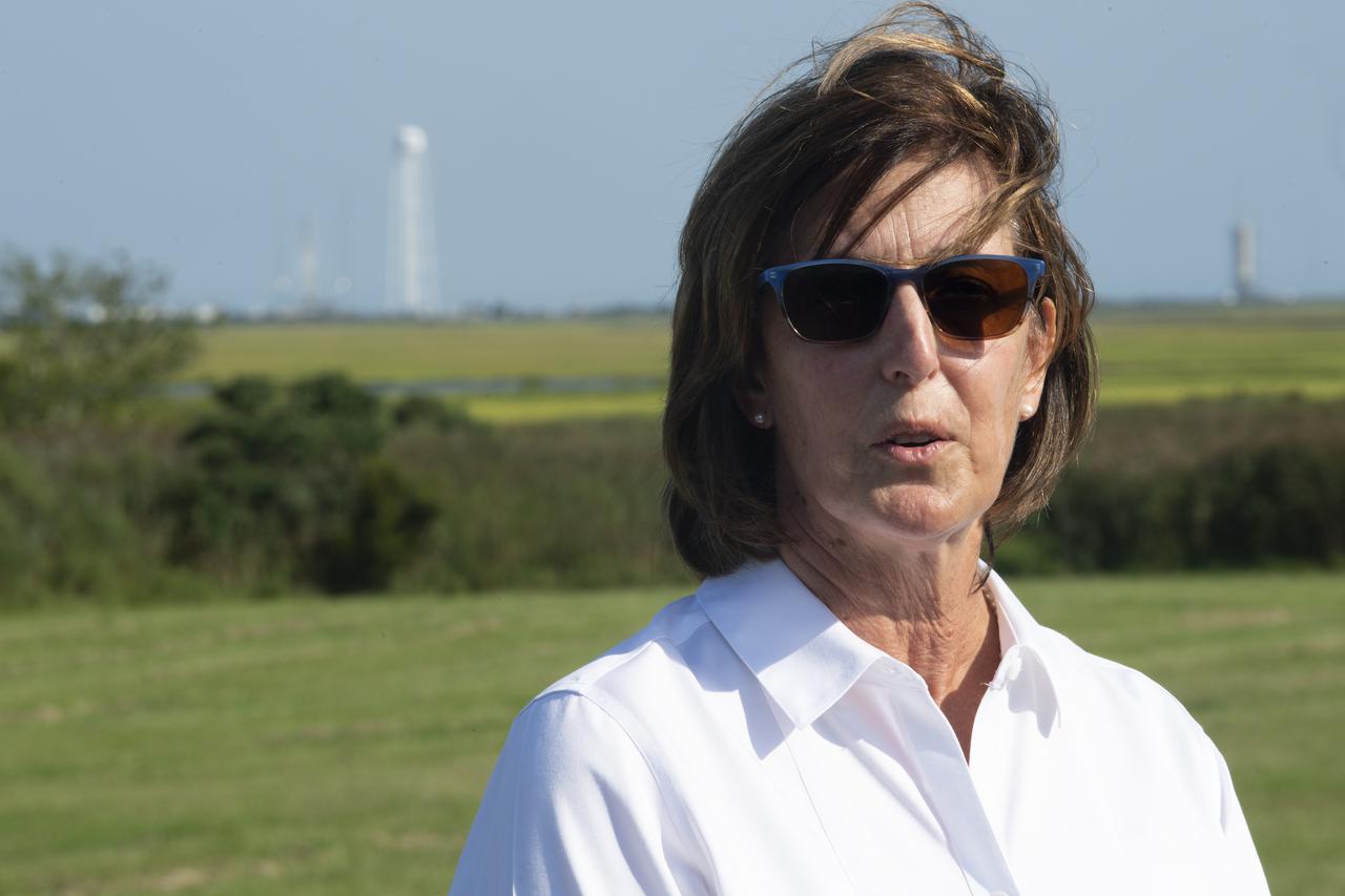 Robyn Gatens, director of NASA’s International Space Station Division, speaks to members of the media prior to the launch of a Northrop Grumman Antares rocket carrying a Cygnus resupply spacecraft, Tuesday, Aug. 10, 2021, at NASA's Wallops Flight Facility in Virginia. Northrop Grumman’s 16th contracted cargo resupply mission for NASA launched at 6:01 p.m. EDT and will deliver nearly 8,200 pounds of science and research, crew supplies and vehicle hardware to the International Space Station and its crew.  Photo Credit: (NASA/Joel Kowsky)