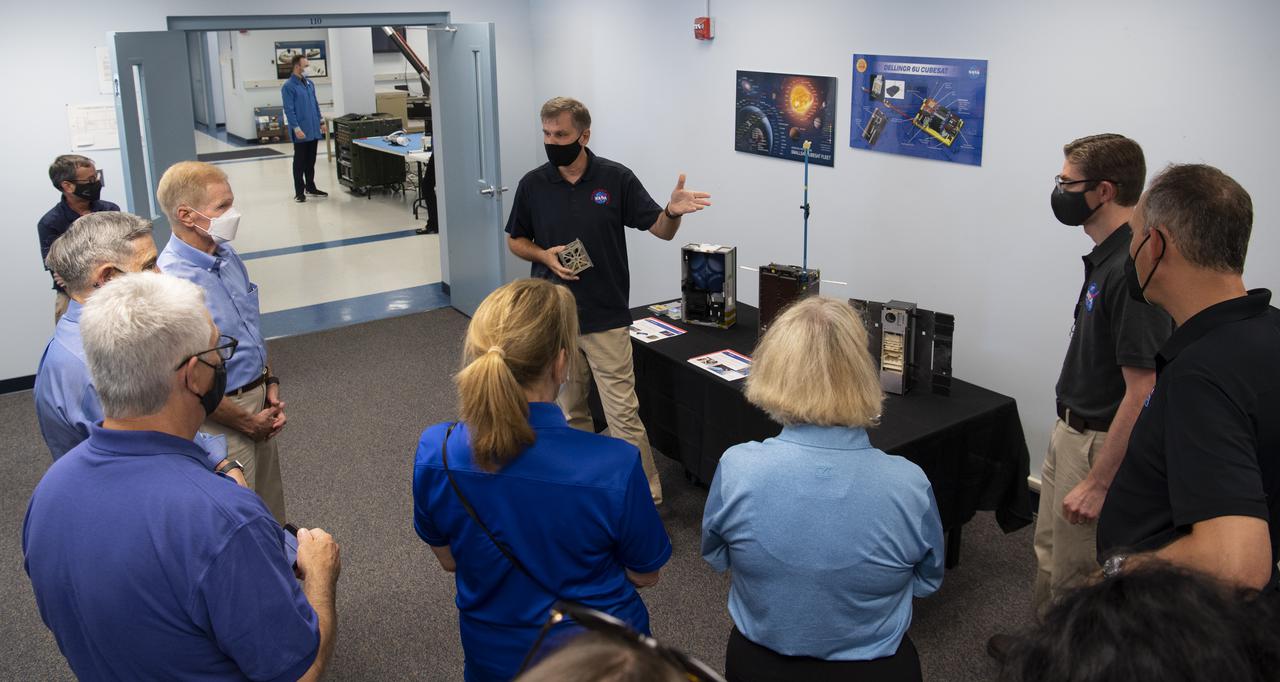 Dave Wilcox, chief of the Small Satellite Project Office at NASA's Wallops Flight Facility, center, speaks about cubesats with NASA Administrator Bill Nelson, Bob Cabana, NASA associate administrator, Dave Pierce, director of NASA's Wallops Flight Facility, NASA Deputy Administrator Pam Melroy, and Thomas Zurbuchen, associate administrator for NASA's Science Mission Directorate during tour of the Small Satellites, Balloon Research and Development Lab, Tuesday, Aug. 10, 2021, at NASA’s Wallops Flight Facility in Virginia. Photo Credit: (NASA/Joel Kowsky)