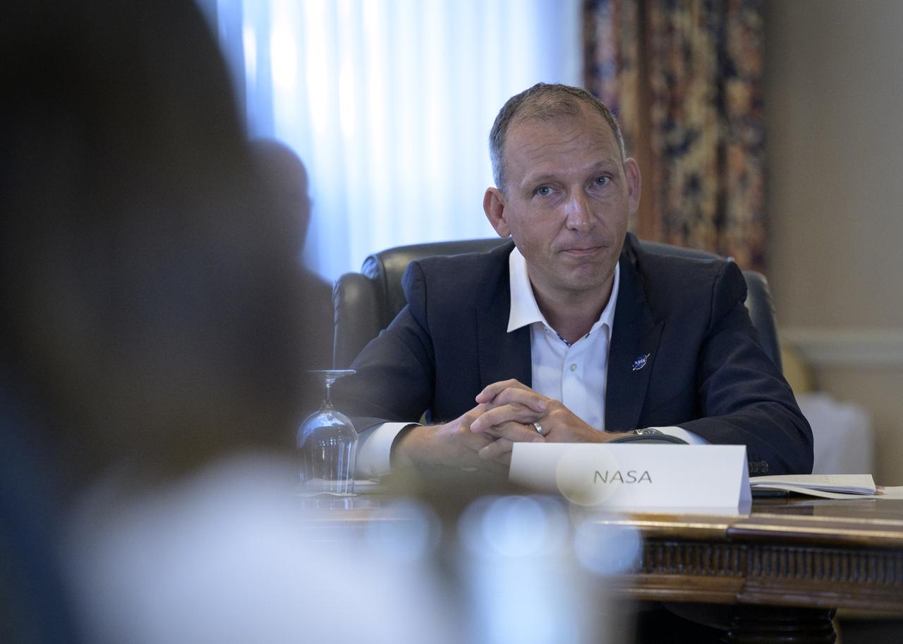 NASA Associate Administrator for Science Thomas Zurbuchen listens to Lisa Campbell, President, Canadian Space Agency (CSA) in a bilateral meeting during the 36th 36th Space Symposium, Monday, Aug. 23, 2021, in Colorado Springs, Colorado. Photo Credit: (NASA/Bill Ingalls)
