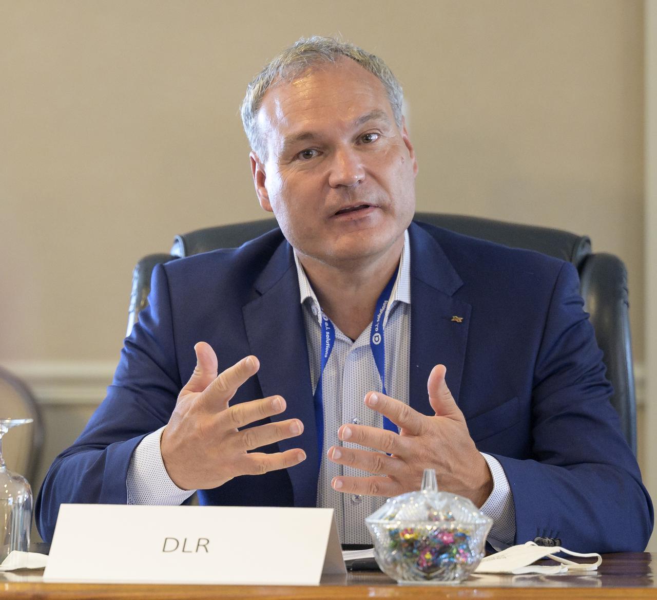 Dr. Walther Pelzer, Member of the German Aerospace Center (DLR) Executive Board, Head of the German Space Agency at DLR speaks in a bilateral meeting with NASA during the 36th Space Symposium, Monday, Aug. 23, 2021, in Colorado Springs, Colorado. Photo Credit: (NASA/Bill Ingalls)