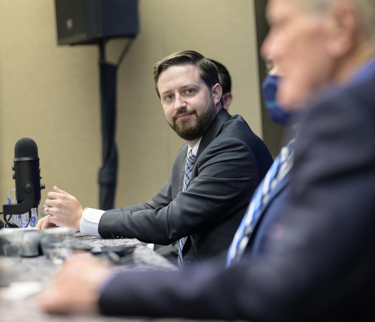 Bradley Cheetham, CEO and president, Advanced Space of Westminster, Colorado listens during a media event where NASA Administrator Bill Nelson introduce three local Colorado companies and university partners that help make NASA’s missions possible, Monday, Aug. 23, 2021, during the 36th Space Symposium in Colorado Springs, Colorado. Photo Credit: (NASA/Bill Ingalls)