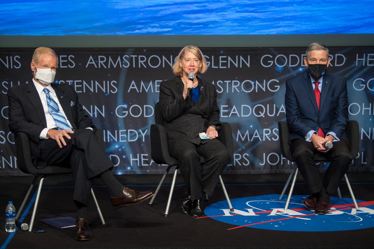 NASA Deputy Administrator Pam Melroy speaks alongside NASA Administrator Bill Nelson, left, and NASA Associate Administrator Bob Cabana, right, during a NASA town hall to discuss the reorganization of the Human Exploration and Operations Mission Directorate into two mission directorates: Exploration Systems Development Mission Directorate (ESDMD) and Space Operations Mission Directorate (SpaceOps), Tuesday, Sept. 21, 2021 at the Mary W. Jackson NASA Headquarters building in Washington. NASA Associate Administrator for SpaceOps, Kathy Lueders, will lead launch and space operations including the International Space Station, the commercialization of low-Earth orbit, and eventually operations on and around the Moon. NASA Associate Administrator for the ESDMD, Jim Free, will lead efforts to define and manage systems development for programs critical to NASA’s Artemis program and the planning of NASA’s Moon to Mars exploration. Photo Credit: (NASA/Aubrey Gemignani)