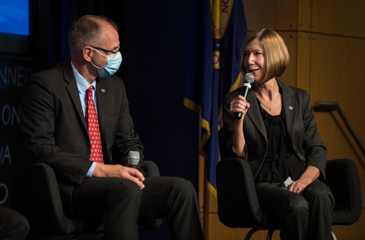 NASA Associate Administrator for the Space Operations Mission Directorate (SpaceOps), Kathy Lueders, right, speaks during a NASA town hall to discuss the reorganization of the Human Exploration and Operations Mission Directorate into two mission directorates: SpaceOps and the Exploration Systems Development Mission Directorate (ESDMD), Tuesday, Sept. 21, 2021 at the Mary W. Jackson NASA Headquarters building in Washington. As head of SpaceOps, Kathy Lueders will lead launch and space operations including the International Space Station, the commercialization of low-Earth orbit, and eventually operations on and around the Moon. Associate Administrator of ESDMD, Jim Free, left, will lead efforts to define and manage systems development for programs critical to NASA’s Artemis program and the planning of NASA’s Moon to Mars exploration. Photo Credit: (NASA/Aubrey Gemignani)