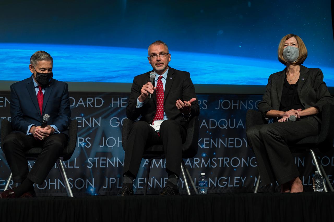 NASA Associate Administrator for the Exploration Systems Development Mission Directorate (ESDMD), Jim Free, speaks alongside NASA Associate Administrator Bob Cabana, left, and NASA Associate Administrator for Space Operations Mission Directorate (SpaceOps), Kathy Lueders, right, during a NASA town hall to discuss the reorganization of the Human Exploration and Operations Mission Directorate into two mission directorates: ESDMD and SpaceOps, Tuesday, Sept. 21, 2021 at the Mary W. Jackson NASA Headquarters building in Washington. Lueders will lead launch and space operations including the International Space Station, the commercialization of low-Earth orbit, and eventually operations on and around the Moon. Free will lead efforts to define and manage systems development for programs critical to NASA’s Artemis program and the planning of NASA’s Moon to Mars exploration. Photo Credit: (NASA/Aubrey Gemignani)